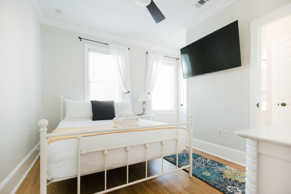 A queen size bed is offered in the front room.