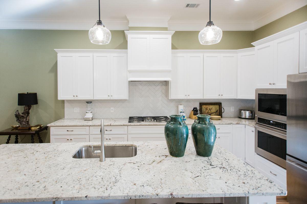 A large kitchen island with seating for four. A great place to serve your guests.