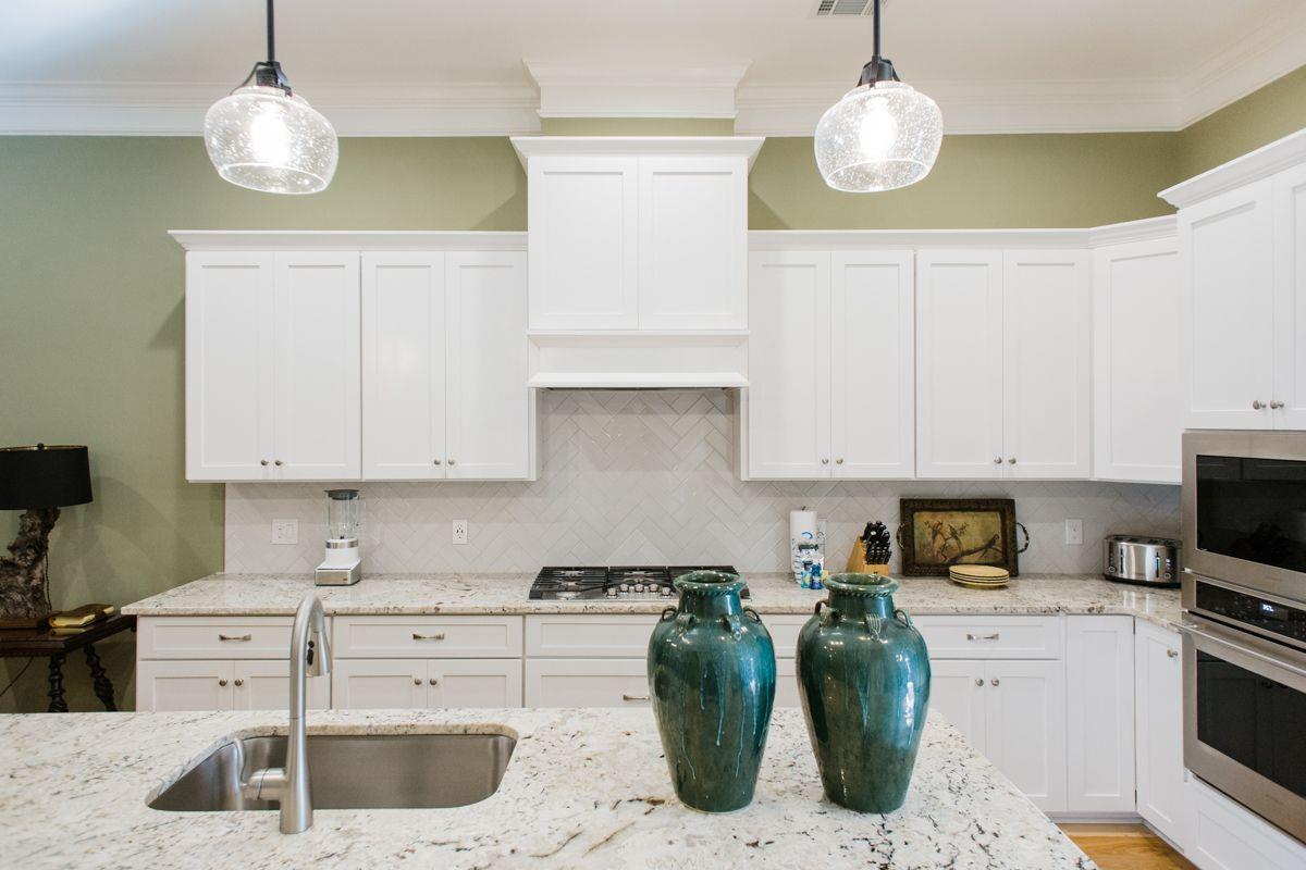 This kitchen is fully equipped from appliances to pantry items.