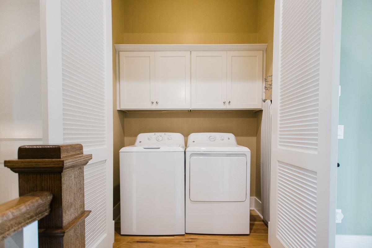 A fullsize washer and dryer can be found on the third level.