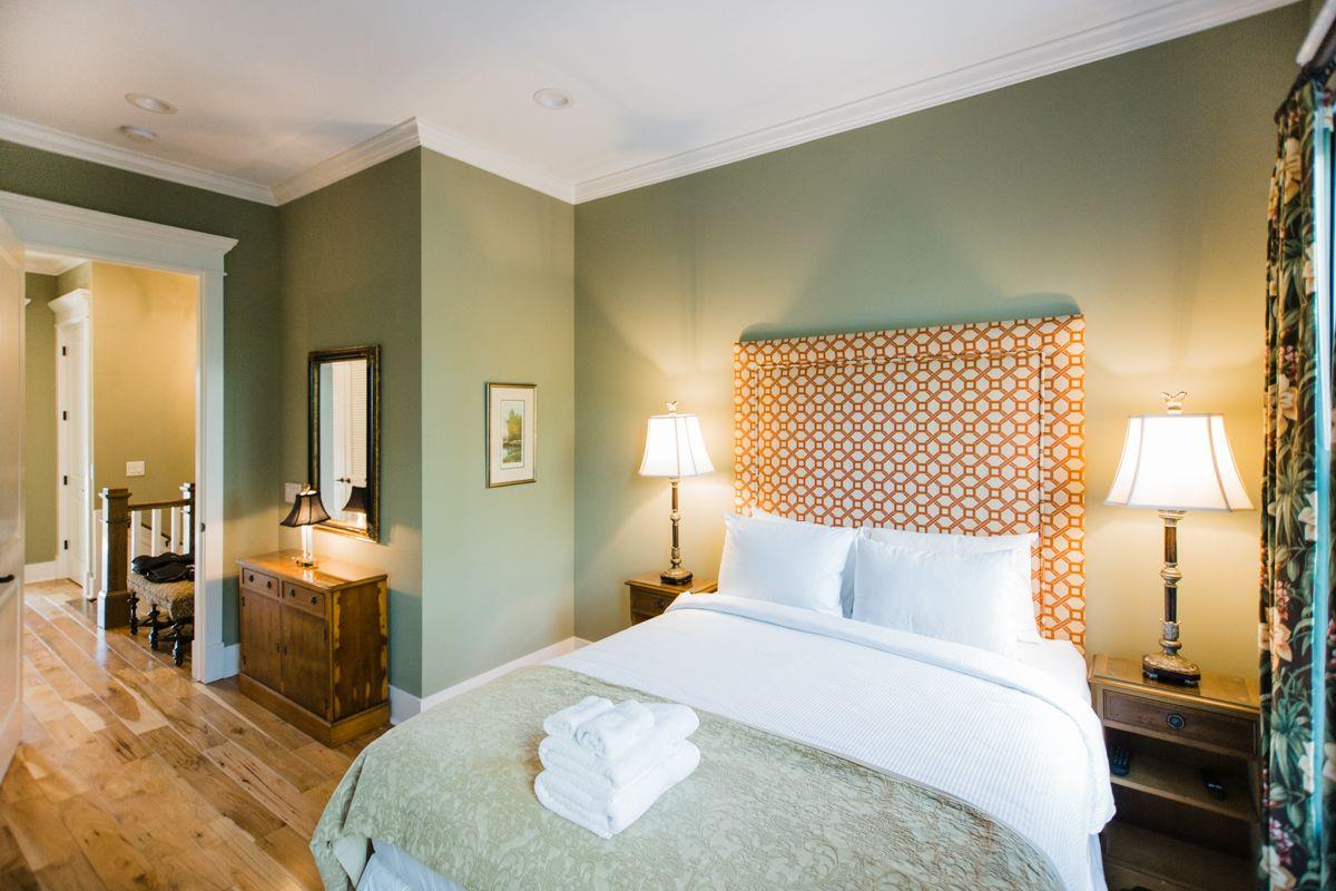 Lamps have been placed on each knight stand, ideal for reading.