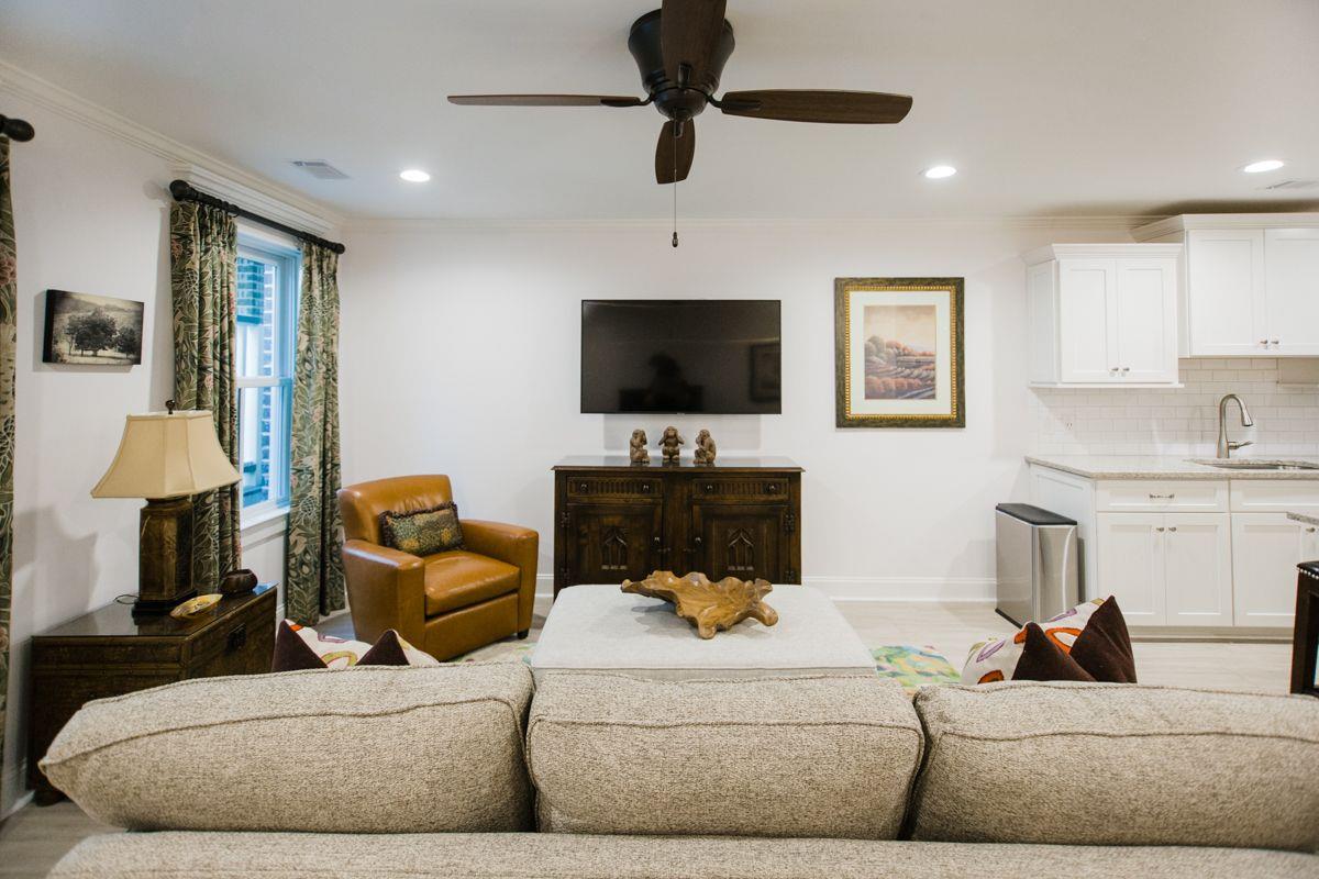 The main living space downstairs offers fine furnishings similar to upstairs.
