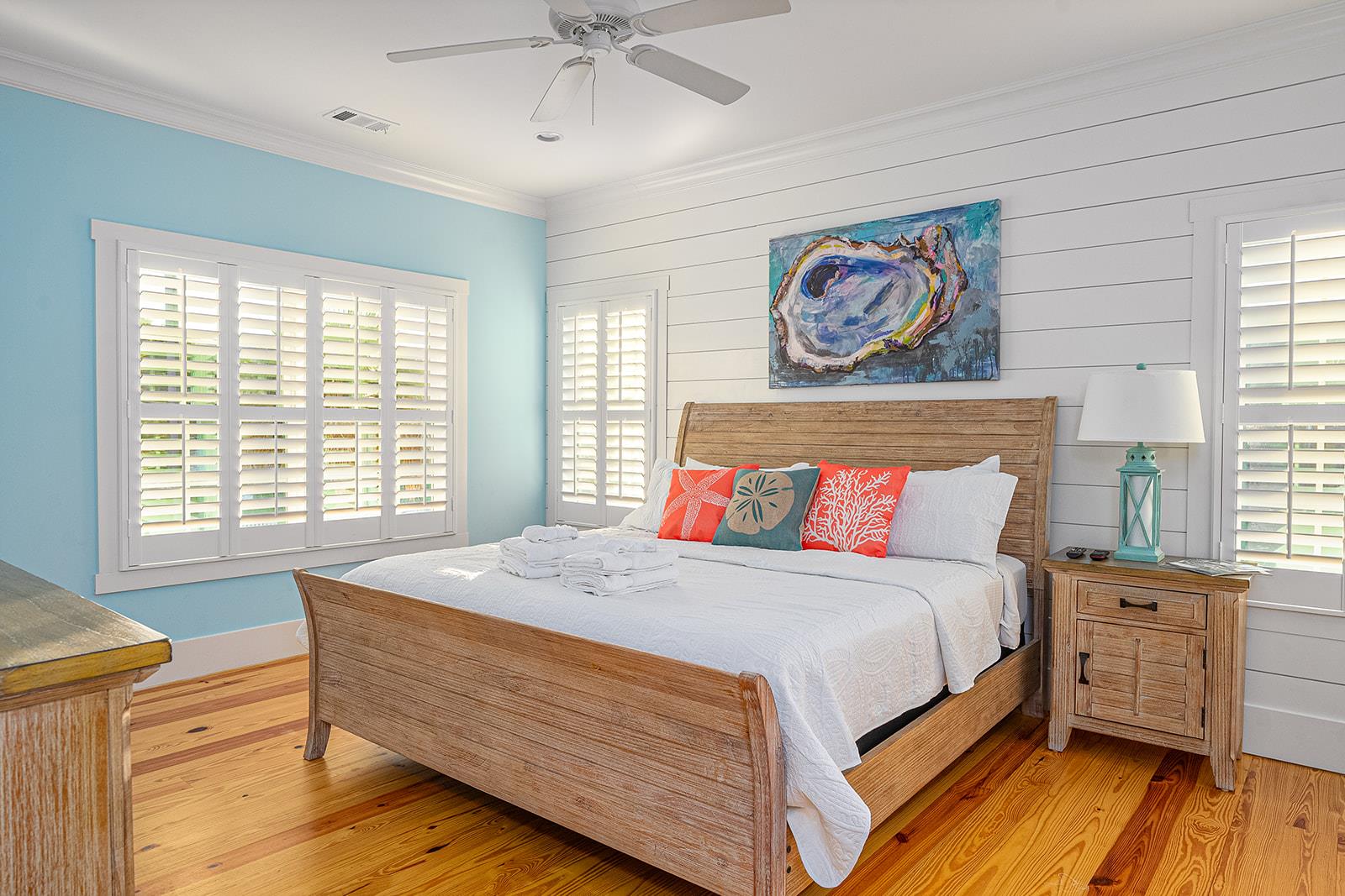 On the same level as the kitchen and living room, guests will find the primary suite with King bed.