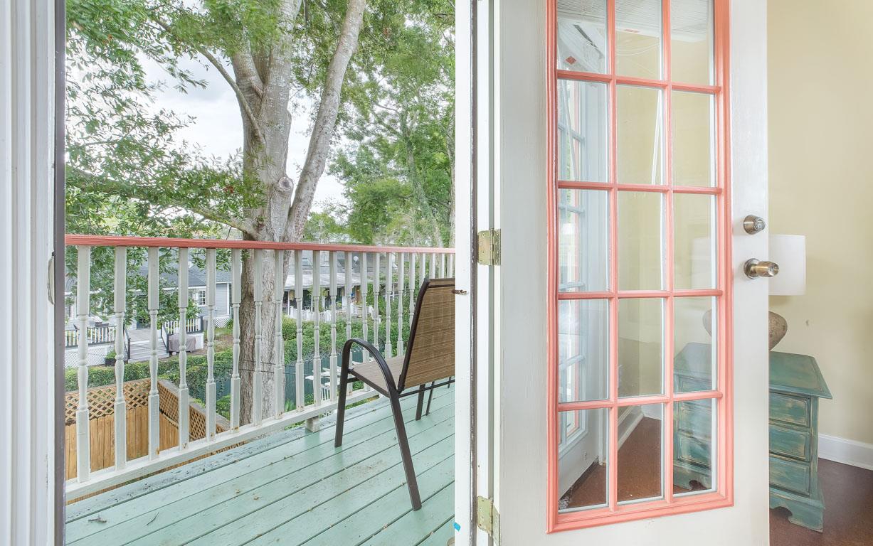 Guests can access the upstairs balcony from this bedroom.