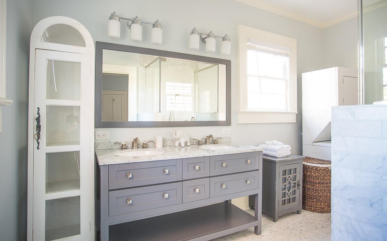 This guest bath is recently renovated with a double vanity.