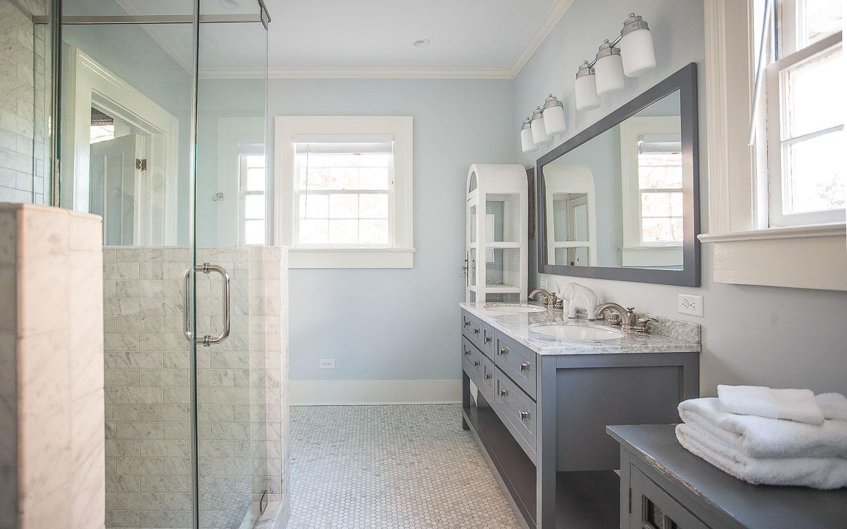 This bath has a spacious walkin shower.