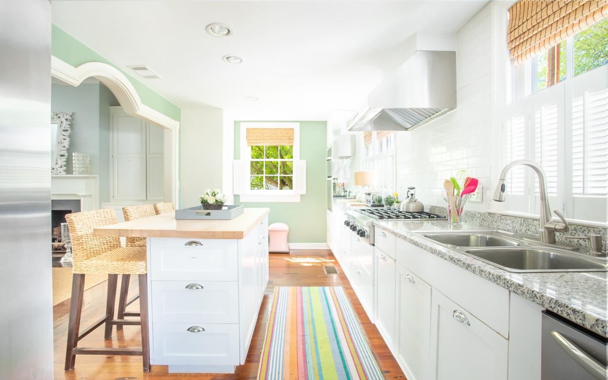 Stainless appliances, granite counters and an oversized butcher block island.