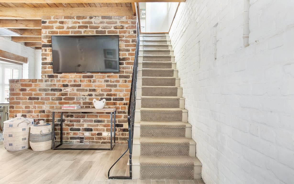 Make your way upstairs to find two bedrooms, and a full bathroom.