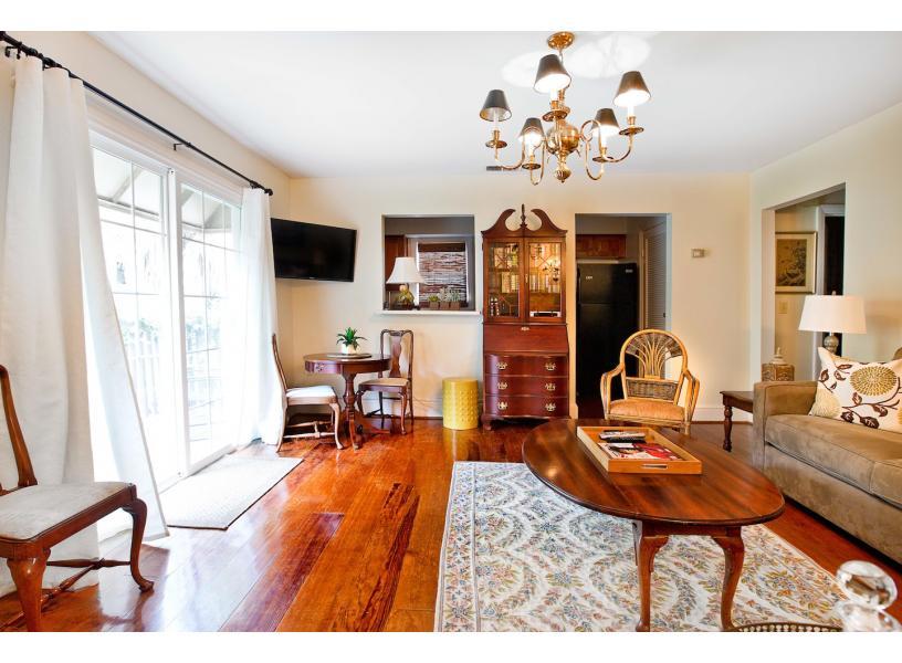 Light and Spacious Living Room with large french doors.