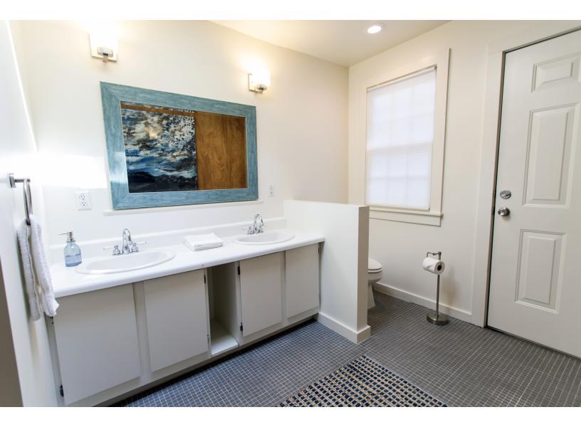 Full bath with double sink vanity