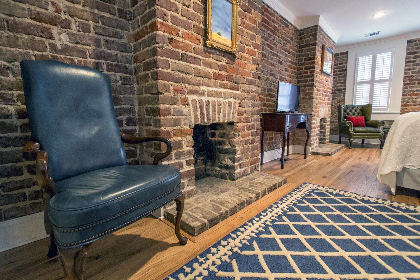 Elegance with two original now decorative fireplaces.