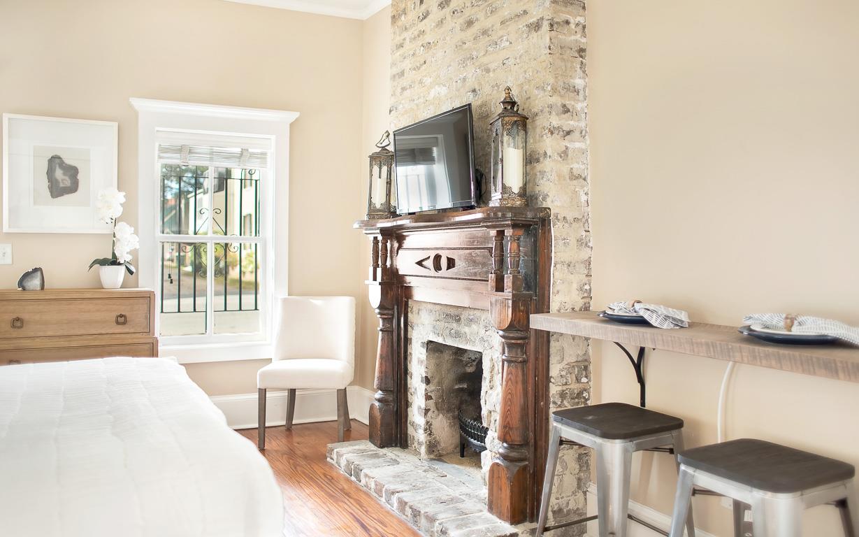 The fireplace now decorative is original to the home.