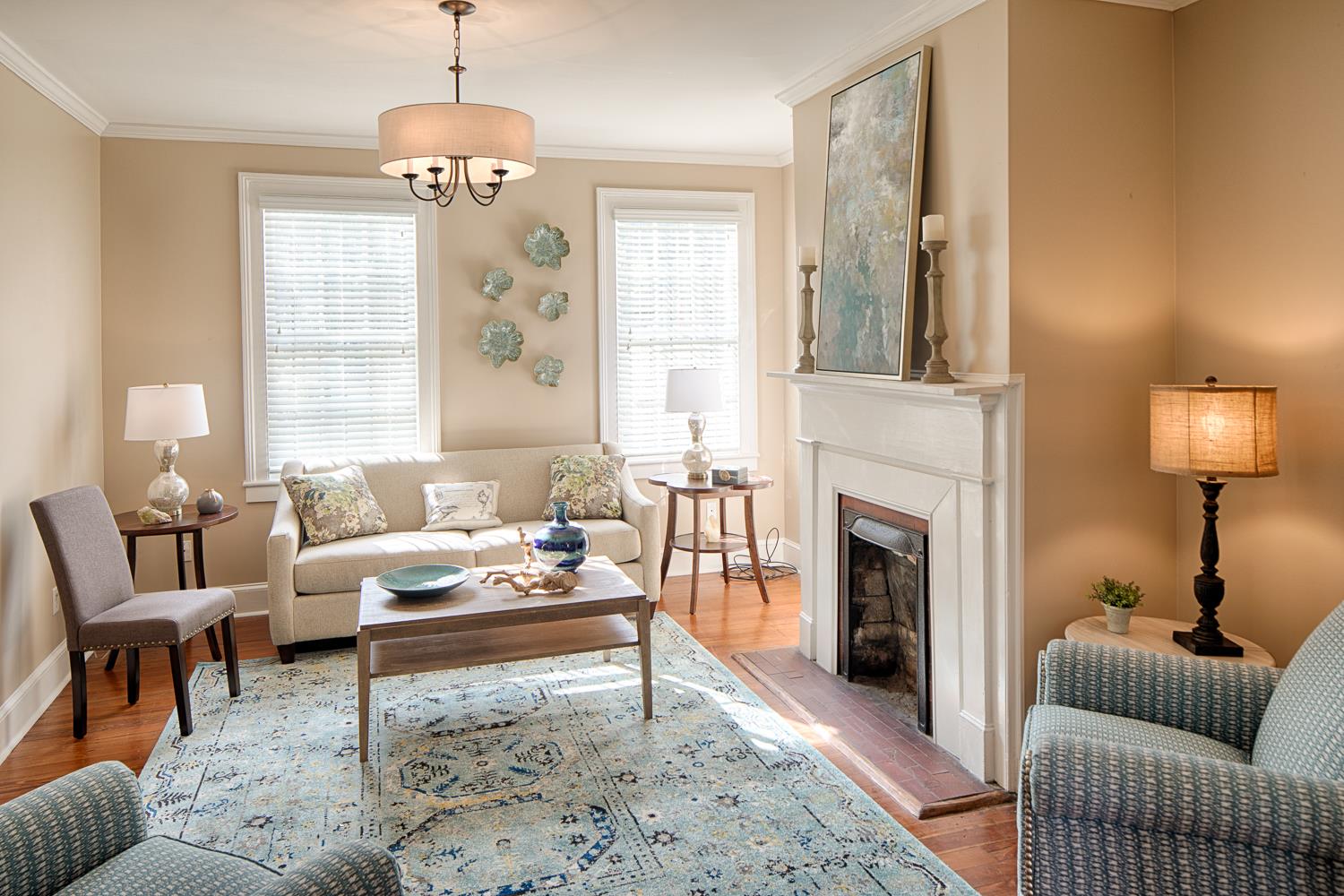 The fireplace now strictly decorative is original to the home.