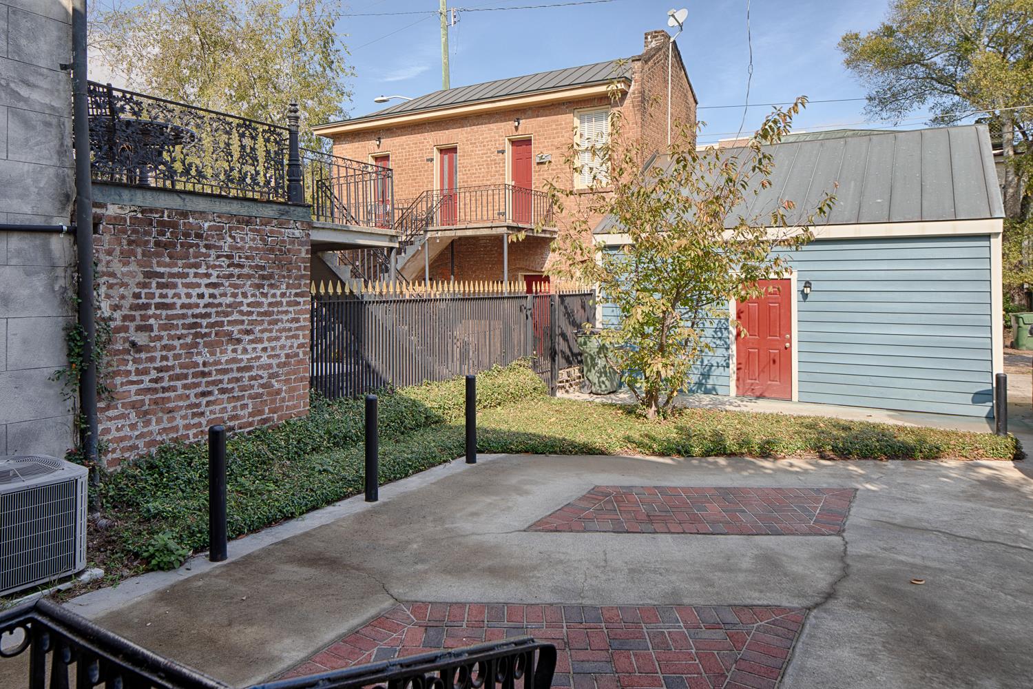 Parking for three cars can be found just behind the home