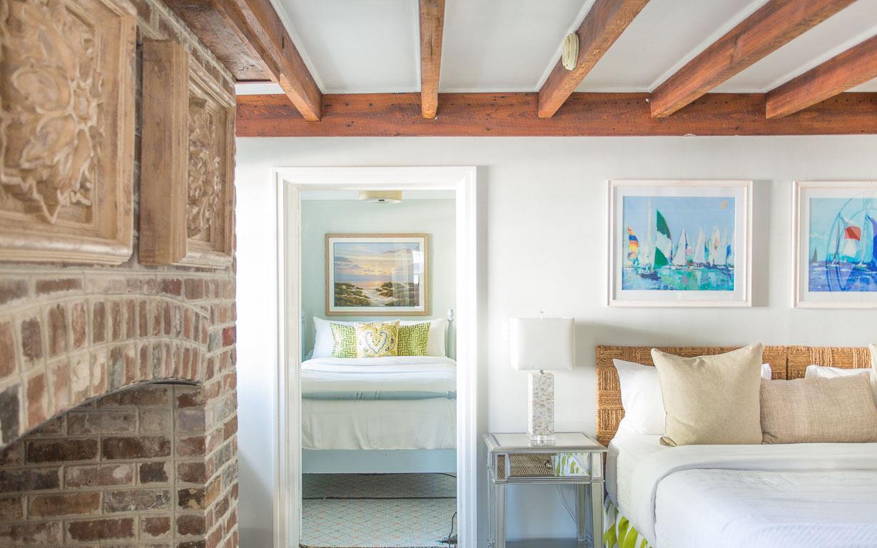 A bonus room with Full size bed and washerdryer is found behind the primary bedroom.