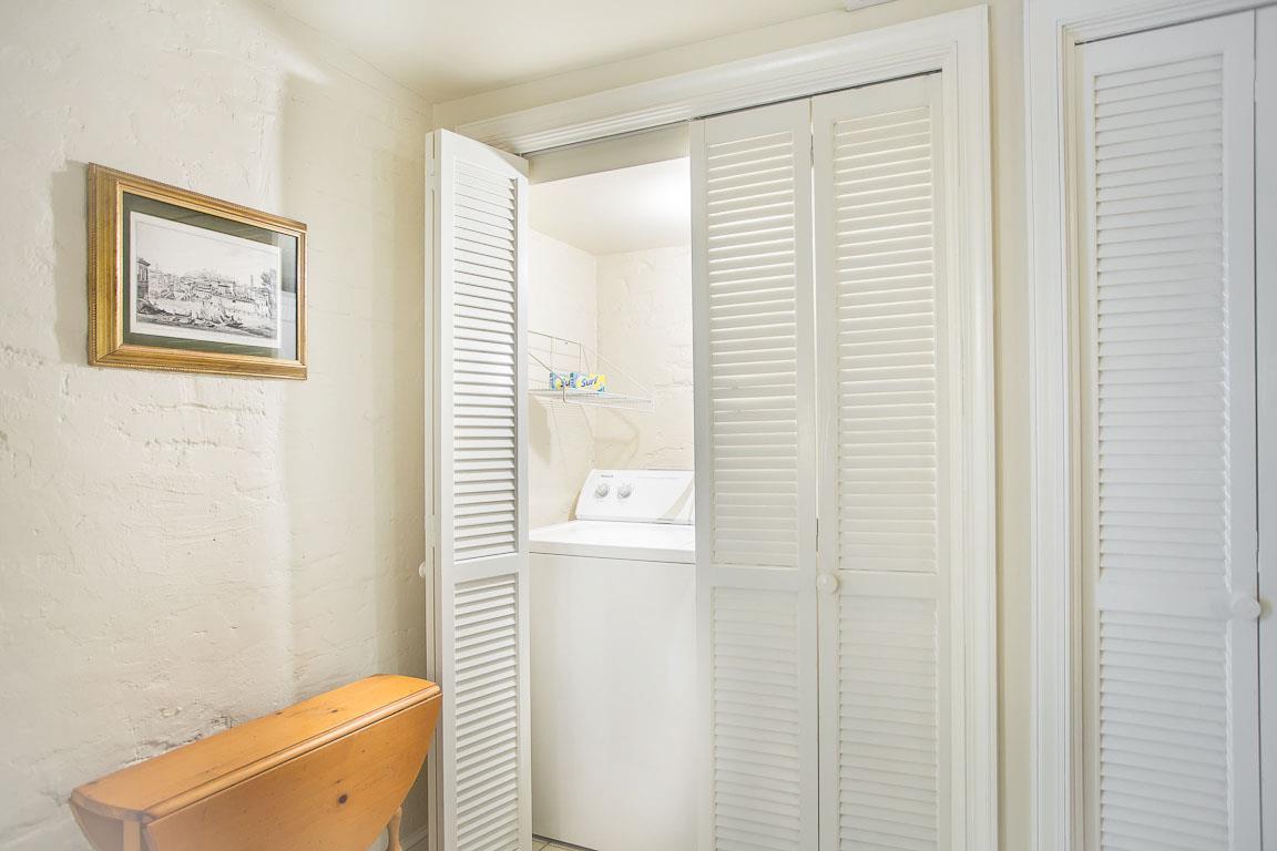 A washer and dryer can be found just off the living room.