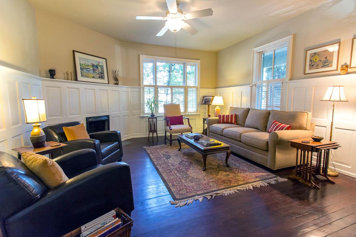 Tall wainscoting and classic furniture invite you in.