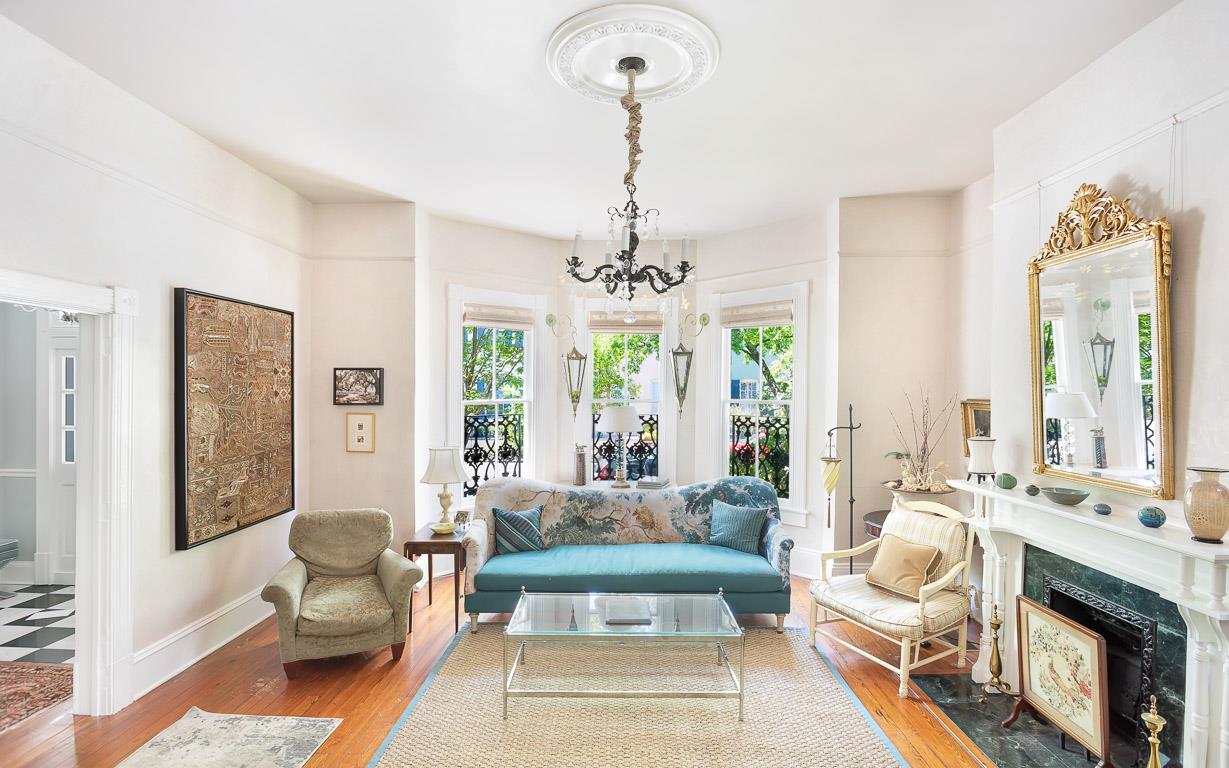 Relax in the parlor, also known as the living room for this property