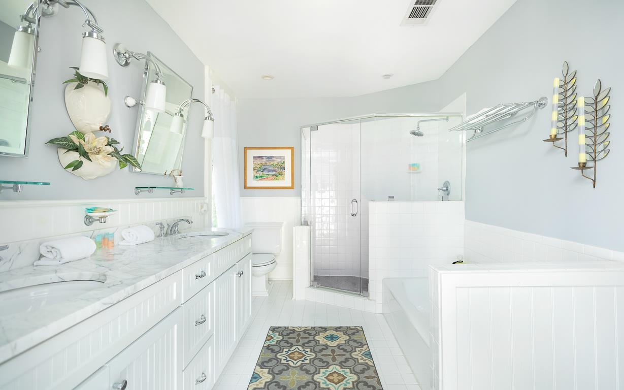 A large soaking tub is ideal for relaxing.