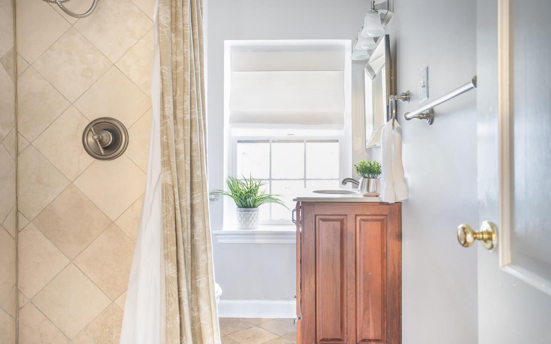 The full bath has a standing shower.