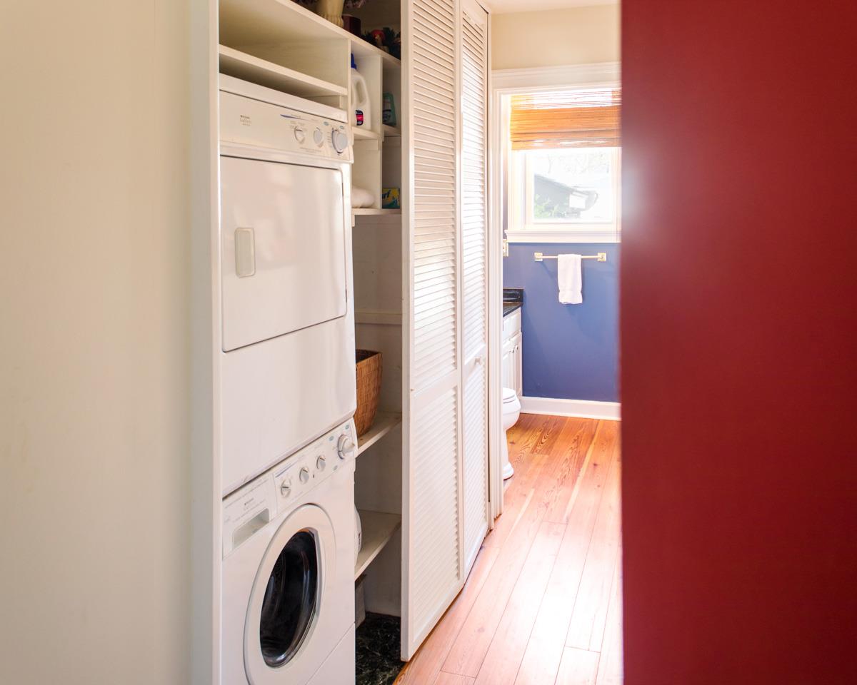 A washer and dryer can be found in the hall next to the half bath.