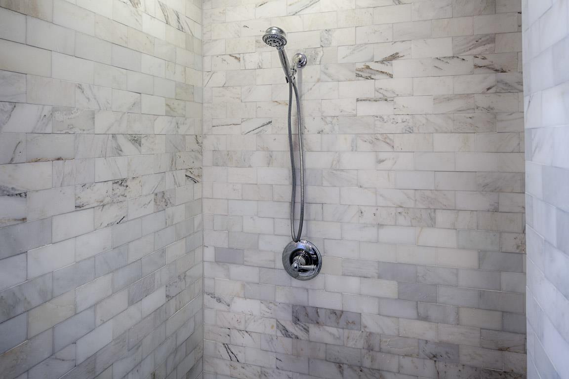 Wash away the day with this luxurious walkin shower.