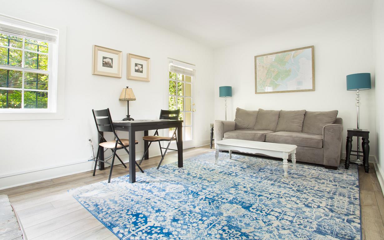 A dining nook can be found in the living room.