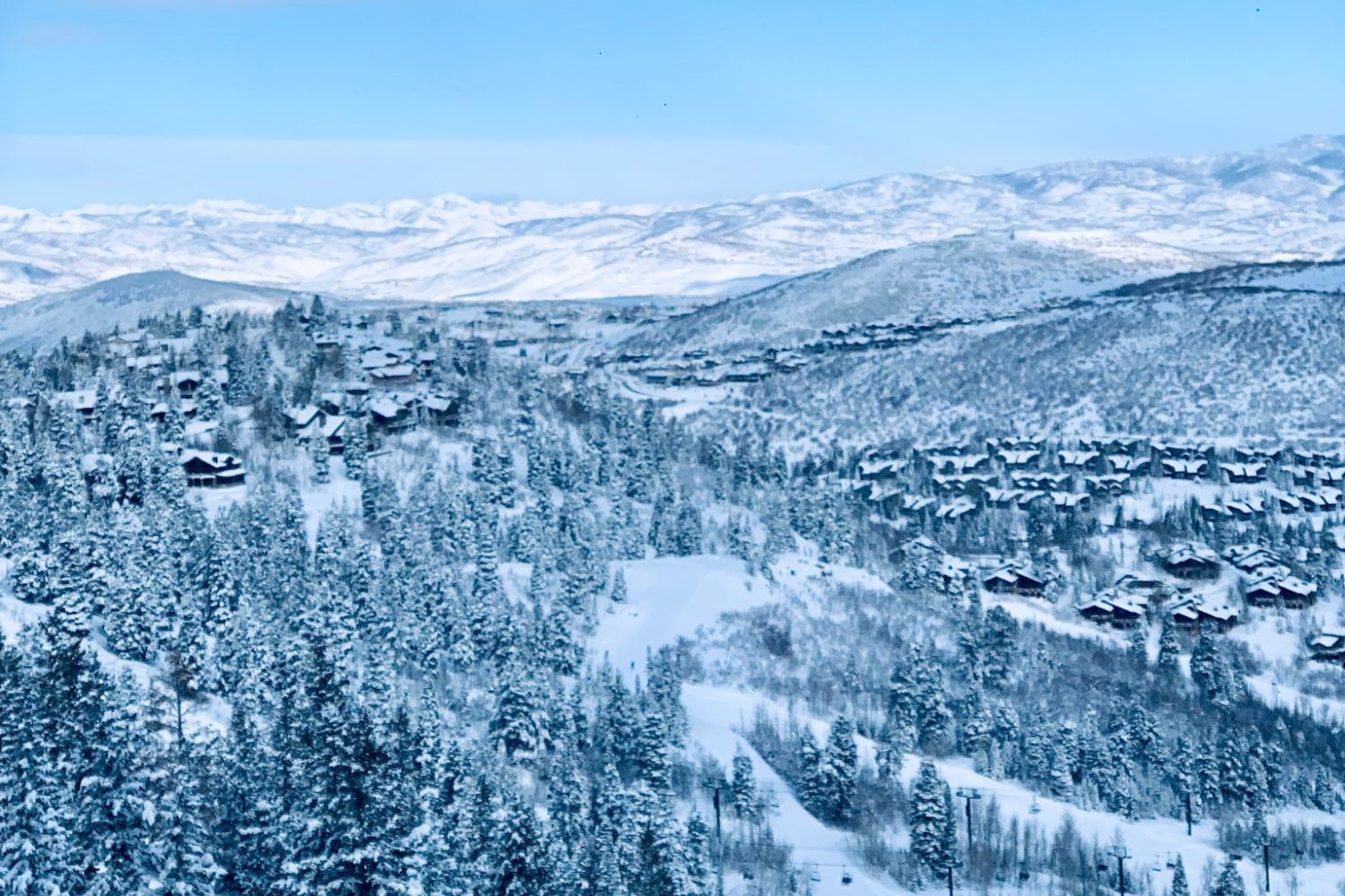 Aerial view of Park City, Utah mountains and homes covered in snow