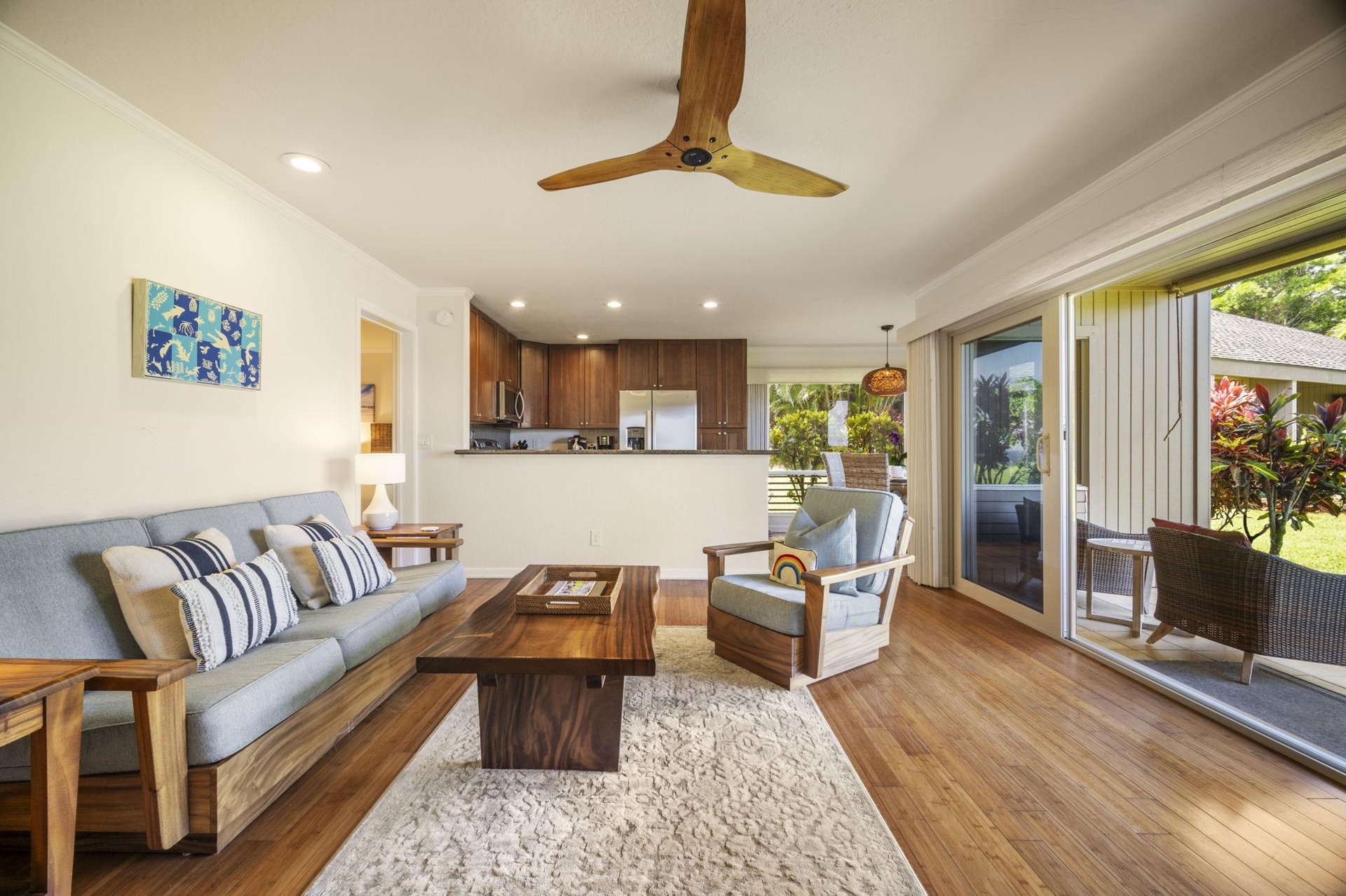 The living room opens up the gorgeous patio views