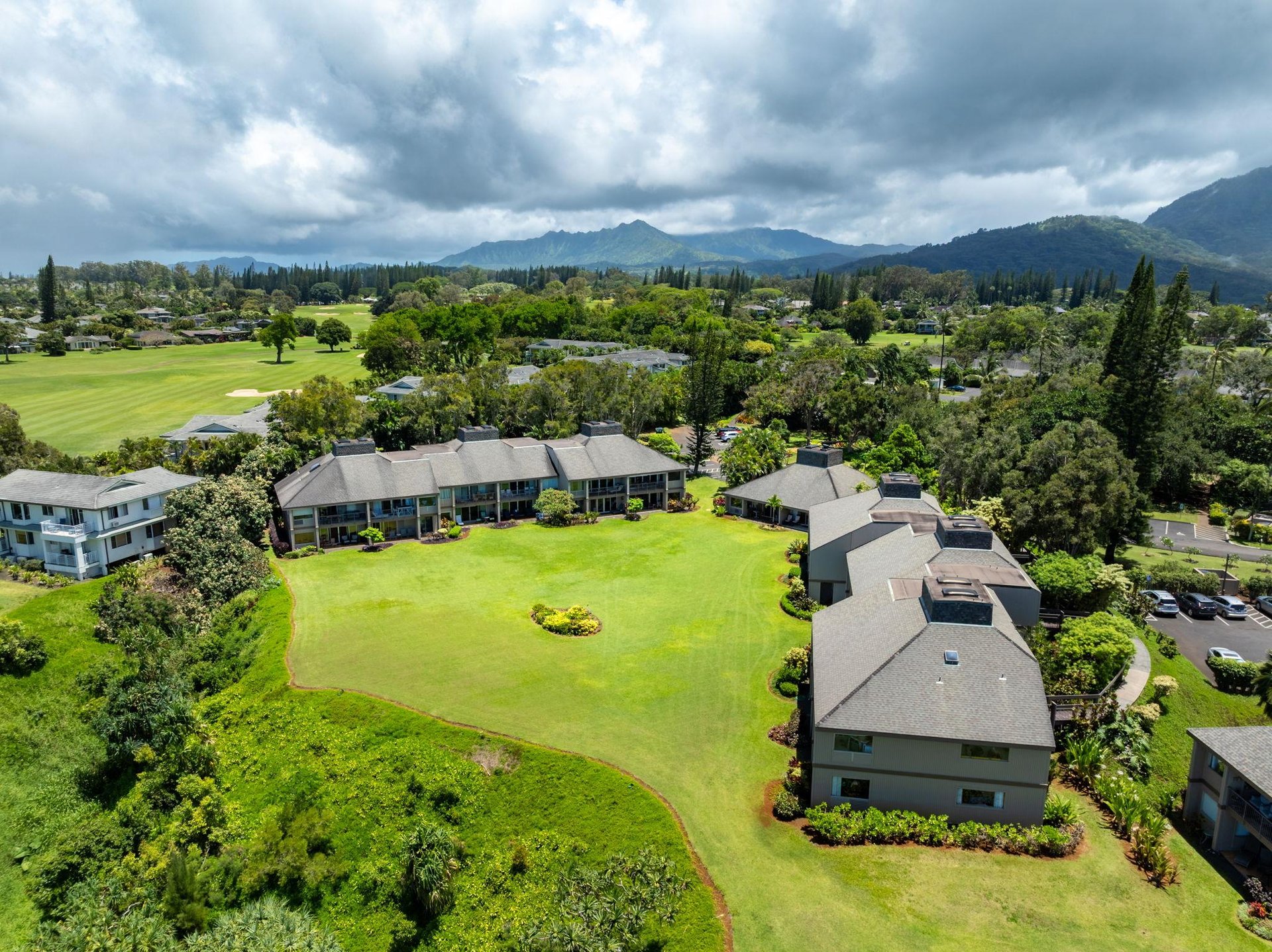 Aerial shot facing Pali Ke Kua 141 on the right