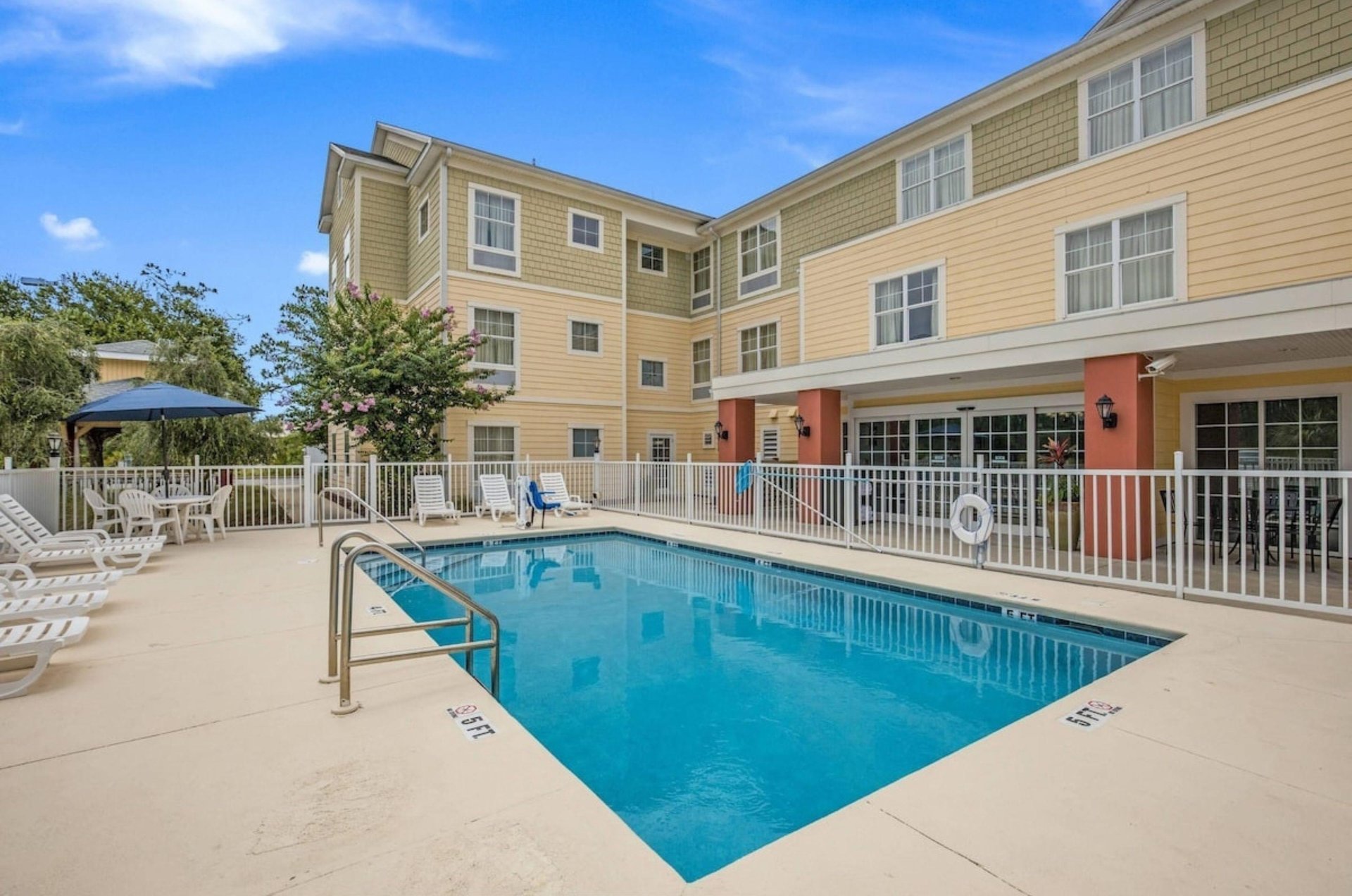 The outdoor swimming pool at MainStay Suites in Port St. Joe Florida