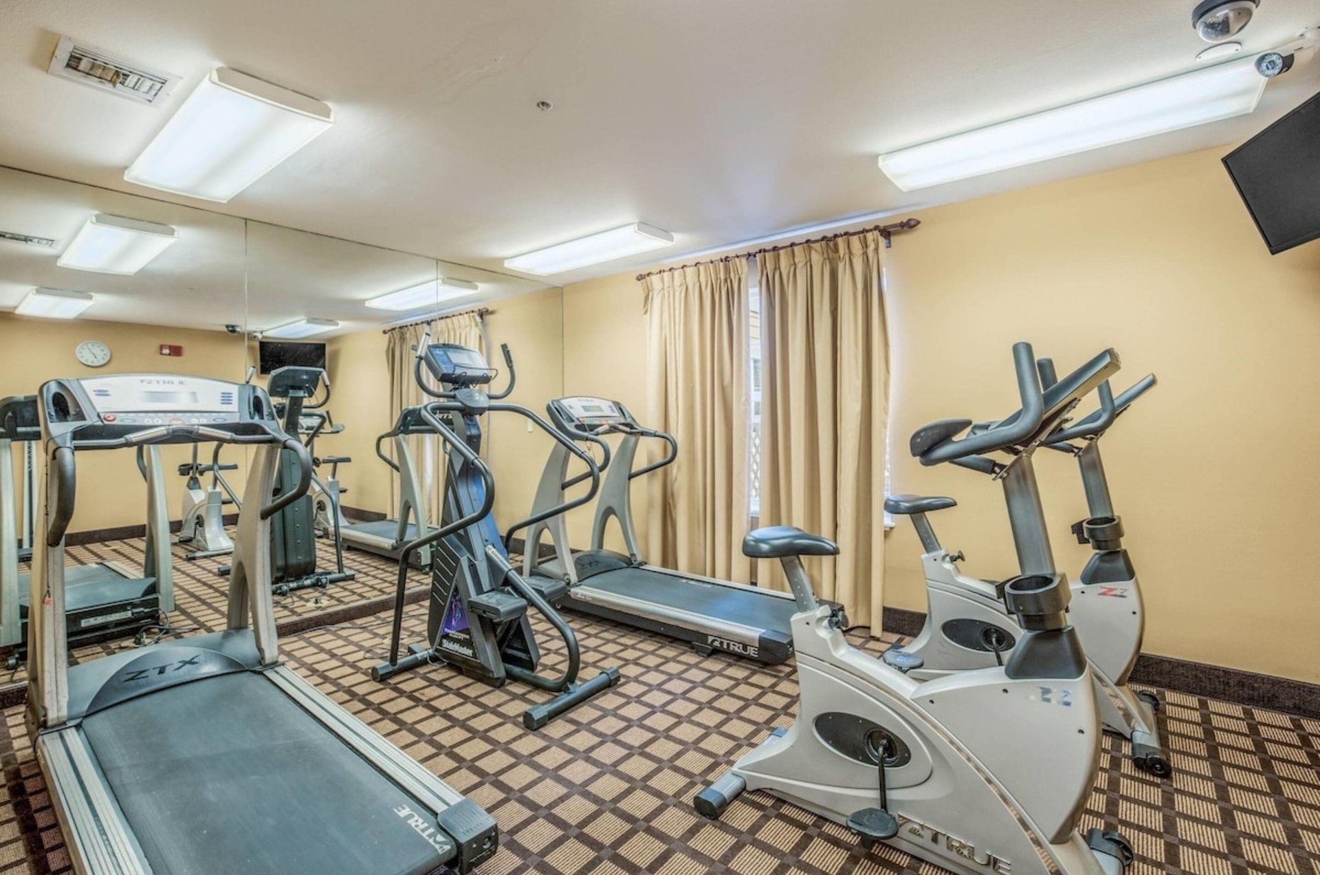 Cardio equipment in the fitness center at MainStay Suites