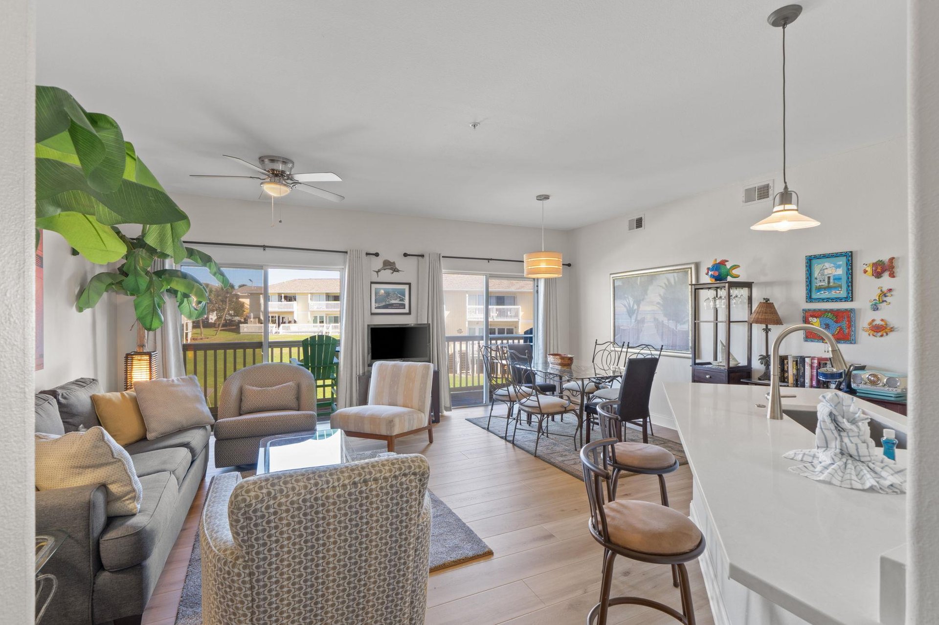 Living room, kitchen bar and dining room