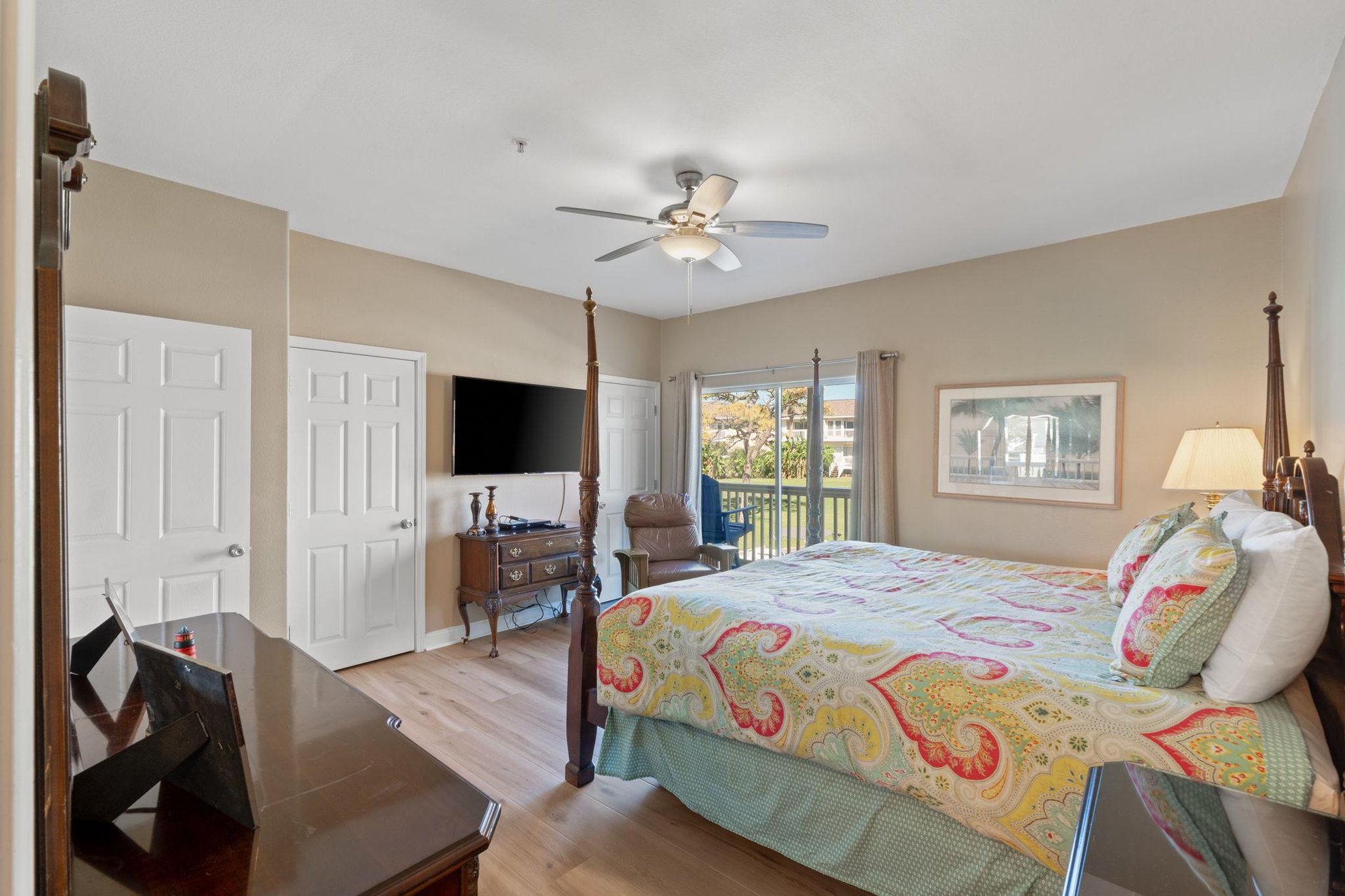 Primary bedroom with balcony view