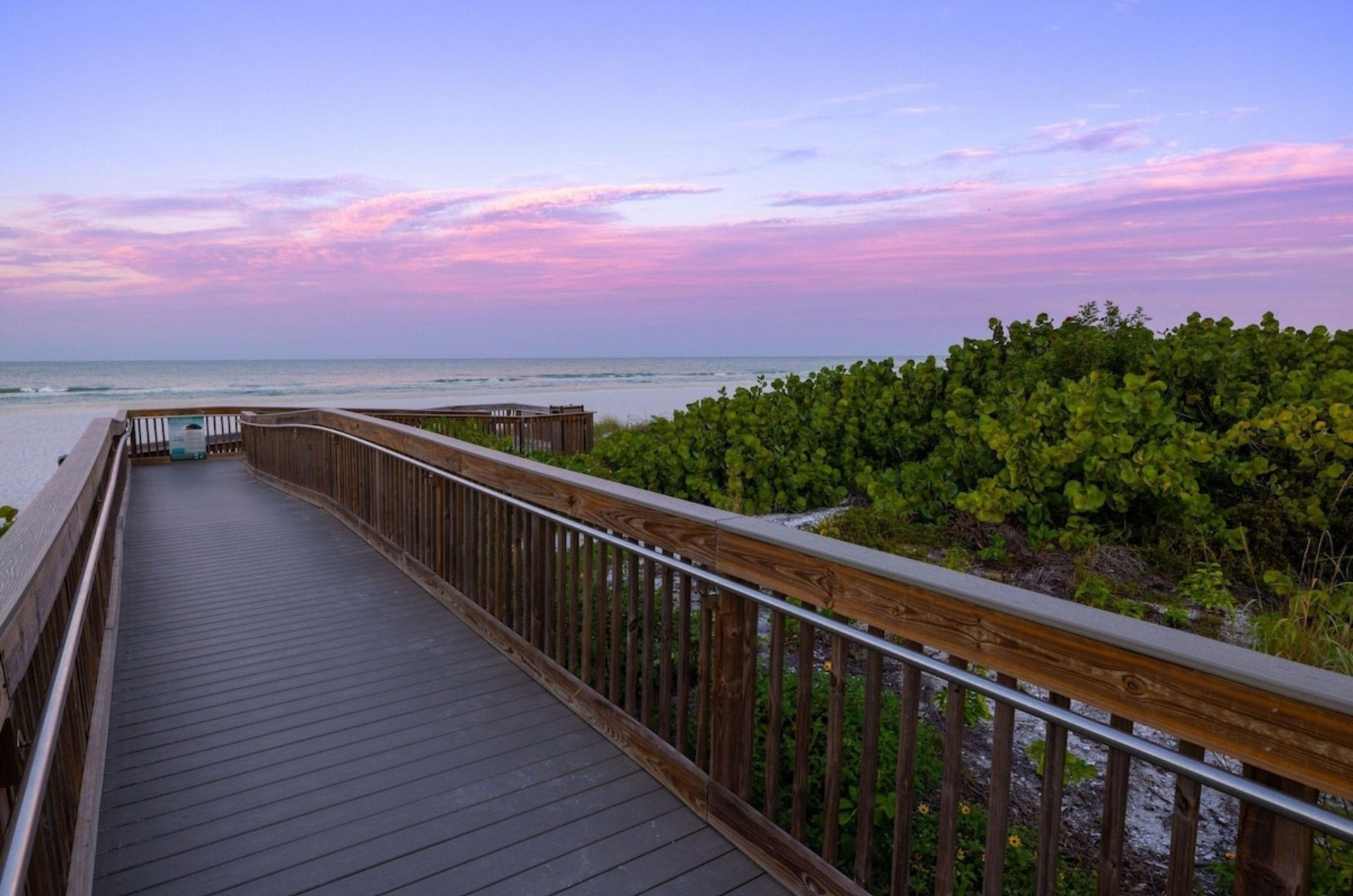 The wooden boardwalk leading to the beach