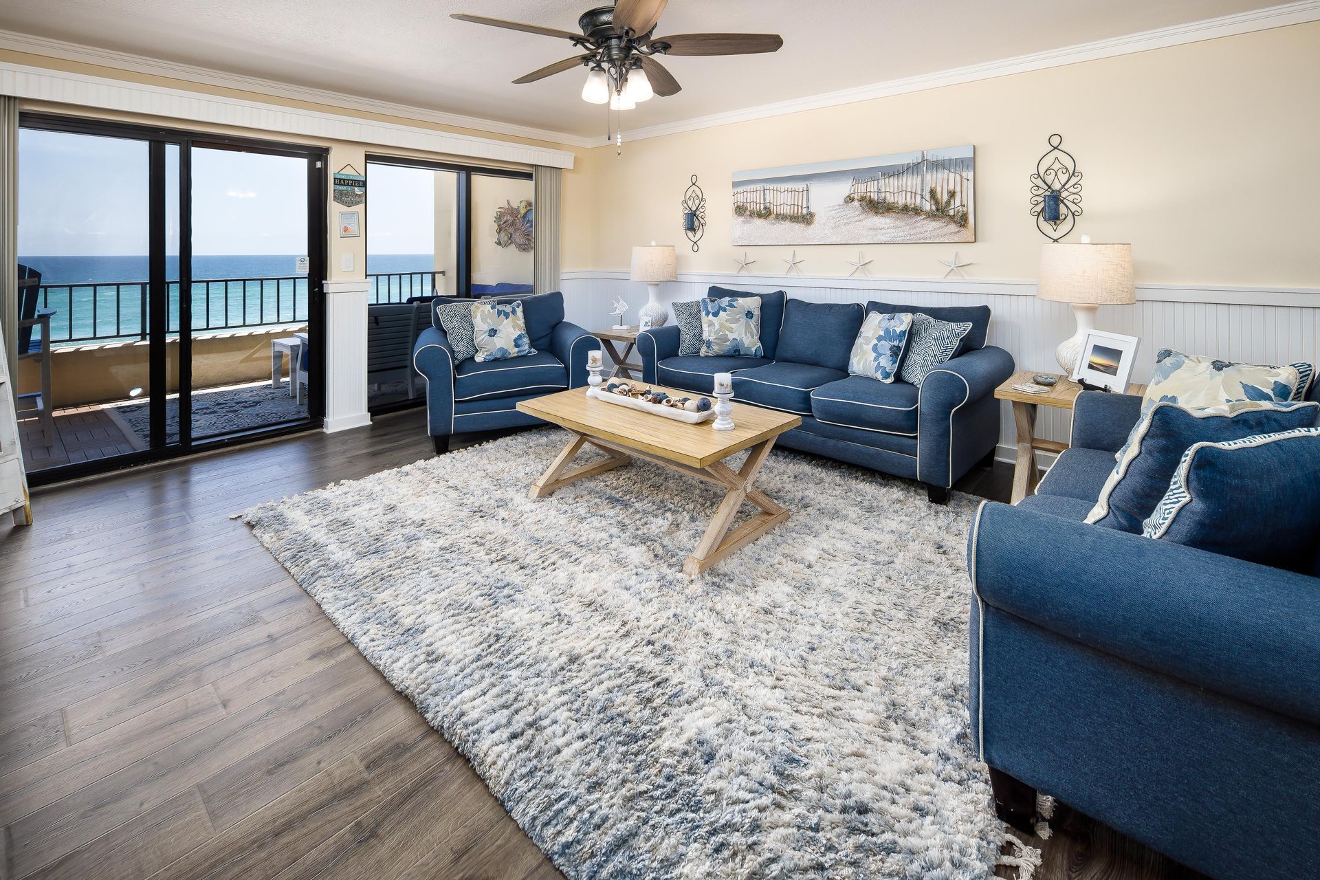 Plenty of seating in the living room with spectacular views of the beach