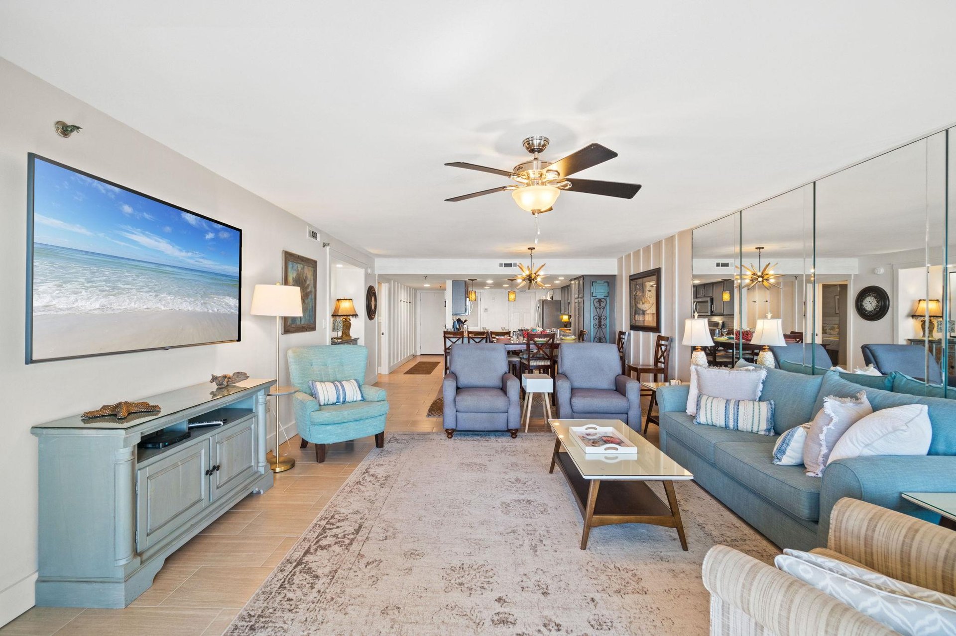 The beach front living room has a spot for everyone. Relax, enjoy the view and create memories.
