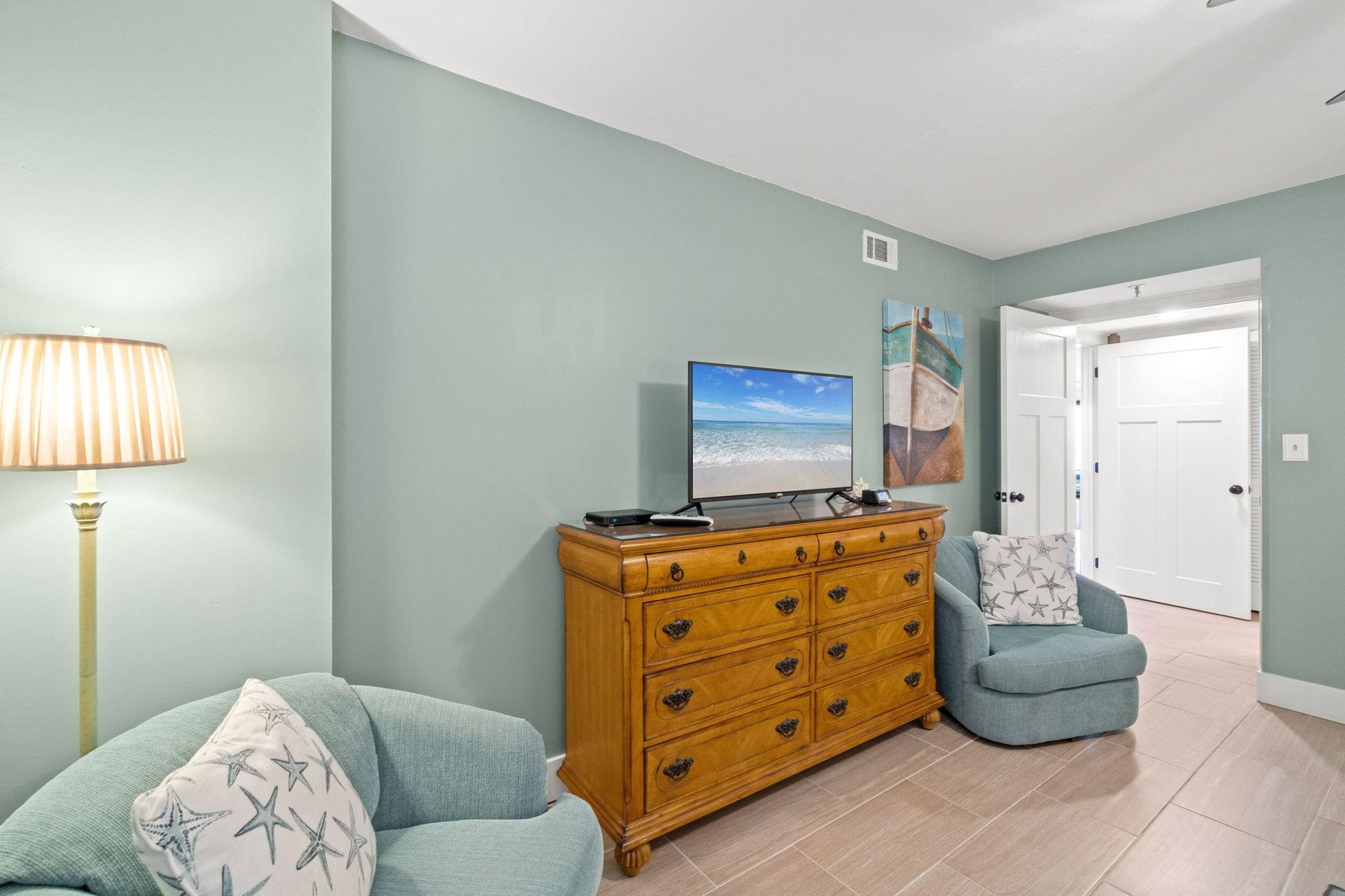 This tranquil guest bedroom NOW FEATURES Tile Flooring...perfect for the entire family.