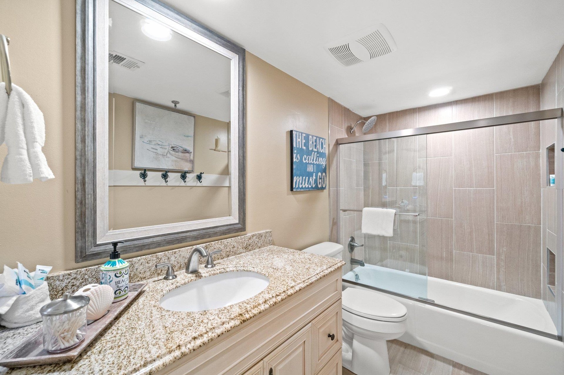 The second full bath equipped with a tubshower combo.