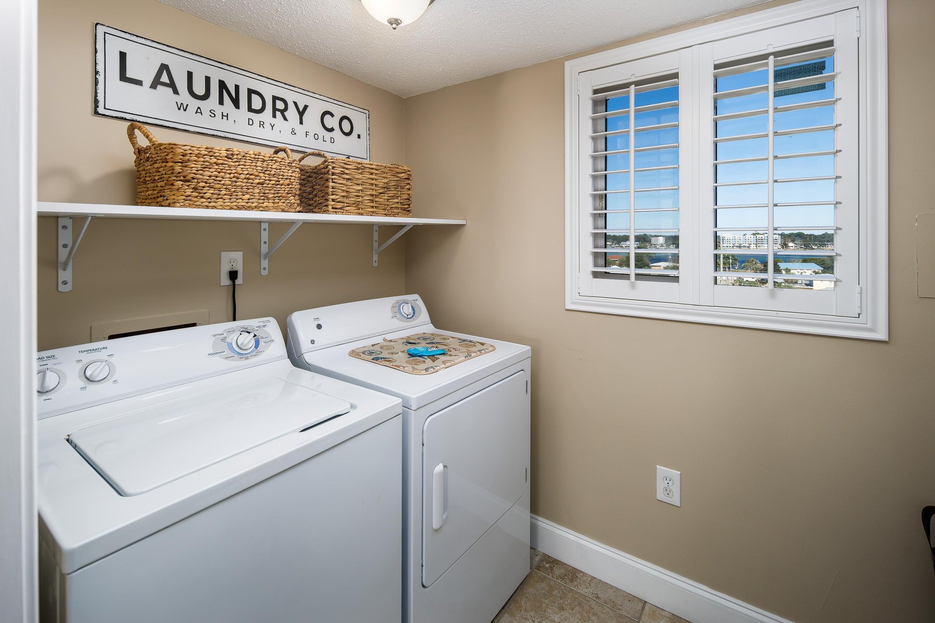 Laundry Room equipped with a FULL size washer and dryer for all your laundry needs