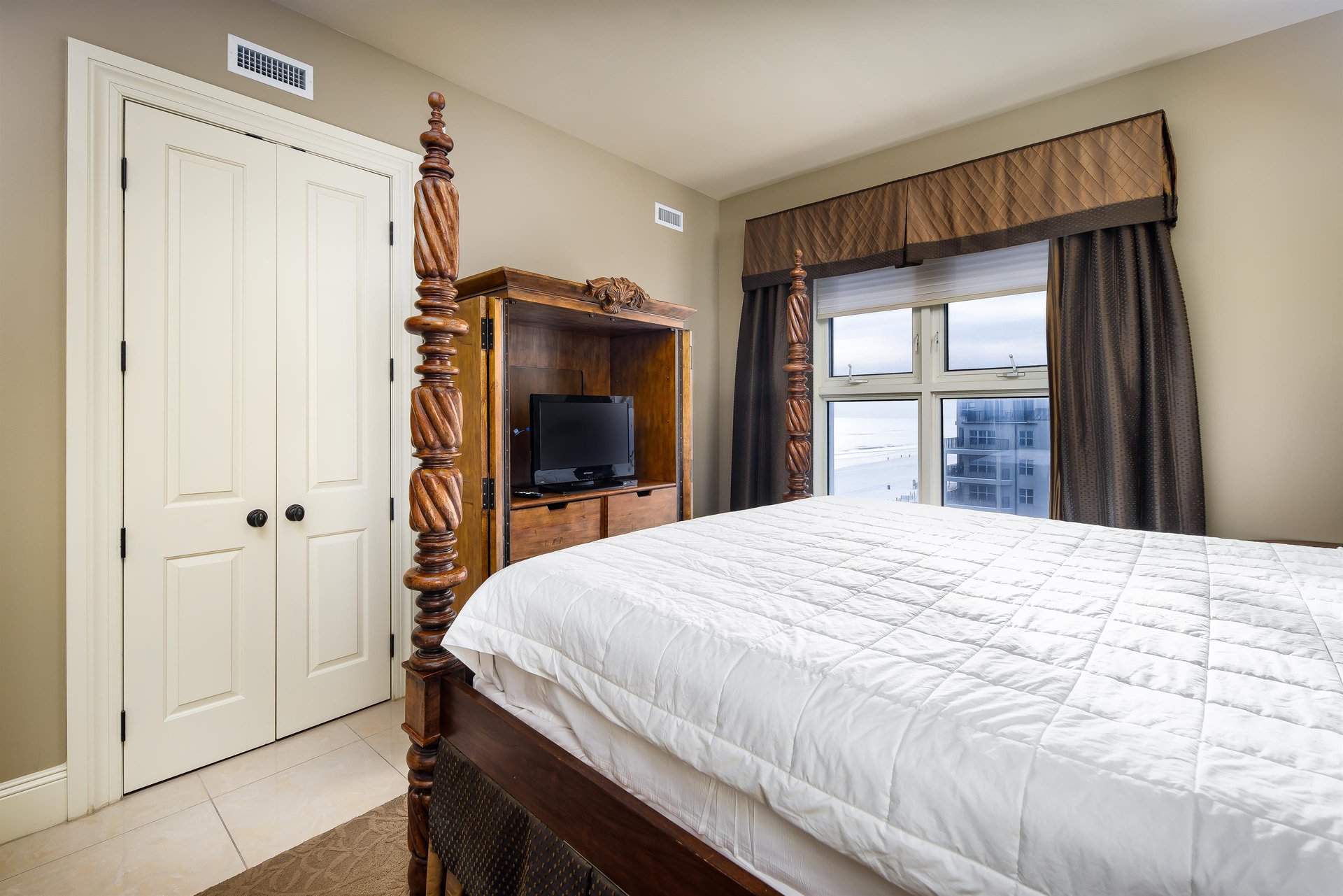Walkin closet and en suite bathroom are pictured here. Automatic lighting in the closets to provide that extra plush amenity earned when renting this amazing penthouse.