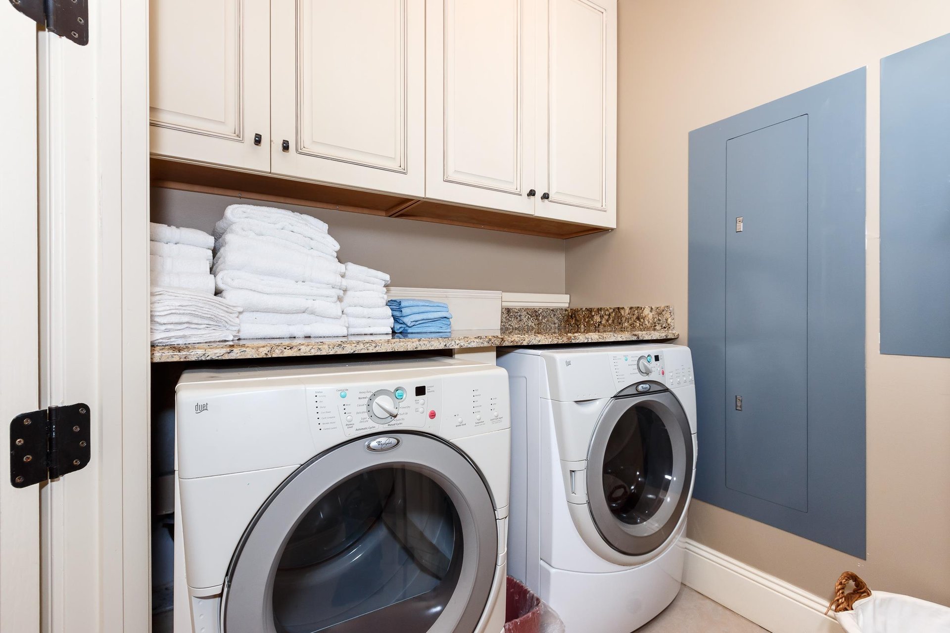 Upscale fullsize washer and dryer for your convenience along with extra storage space