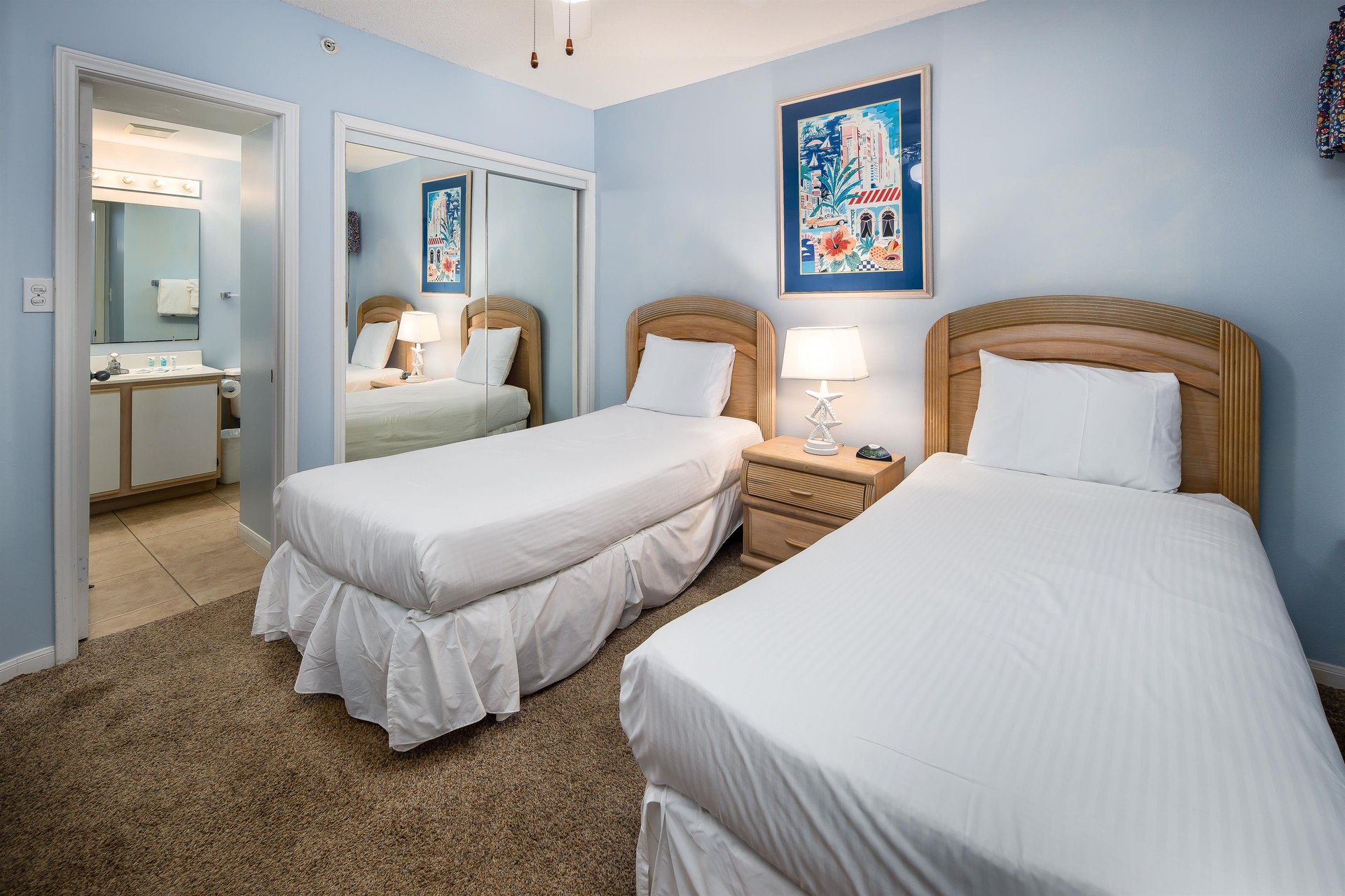 Features twin beds and private bath.
