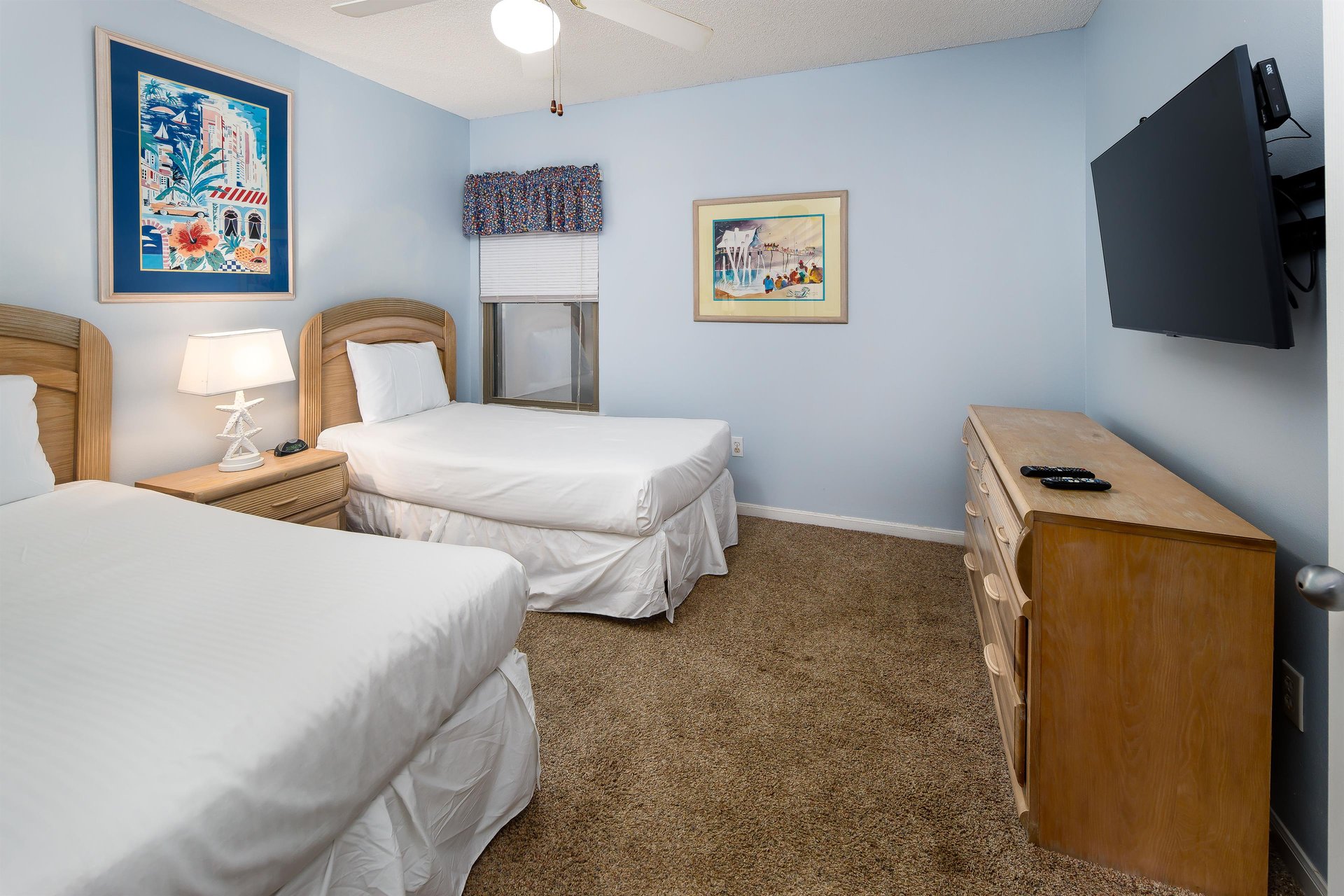 Twin beds and a smart TV