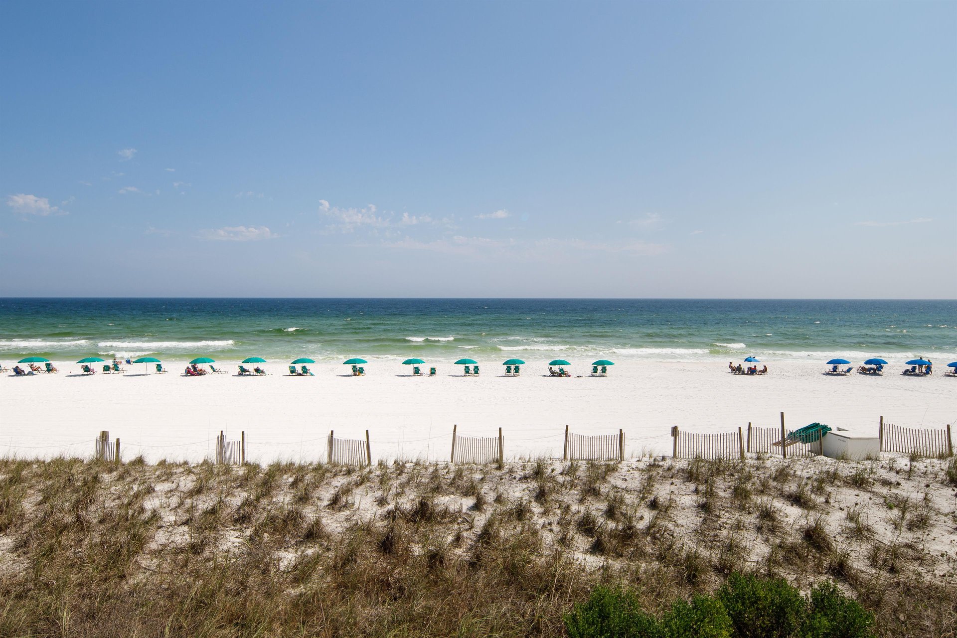 See those beach chairs and umbrellas One set comes with the rental DAILY during season. Compliments of Brooks and Shorey Resorts