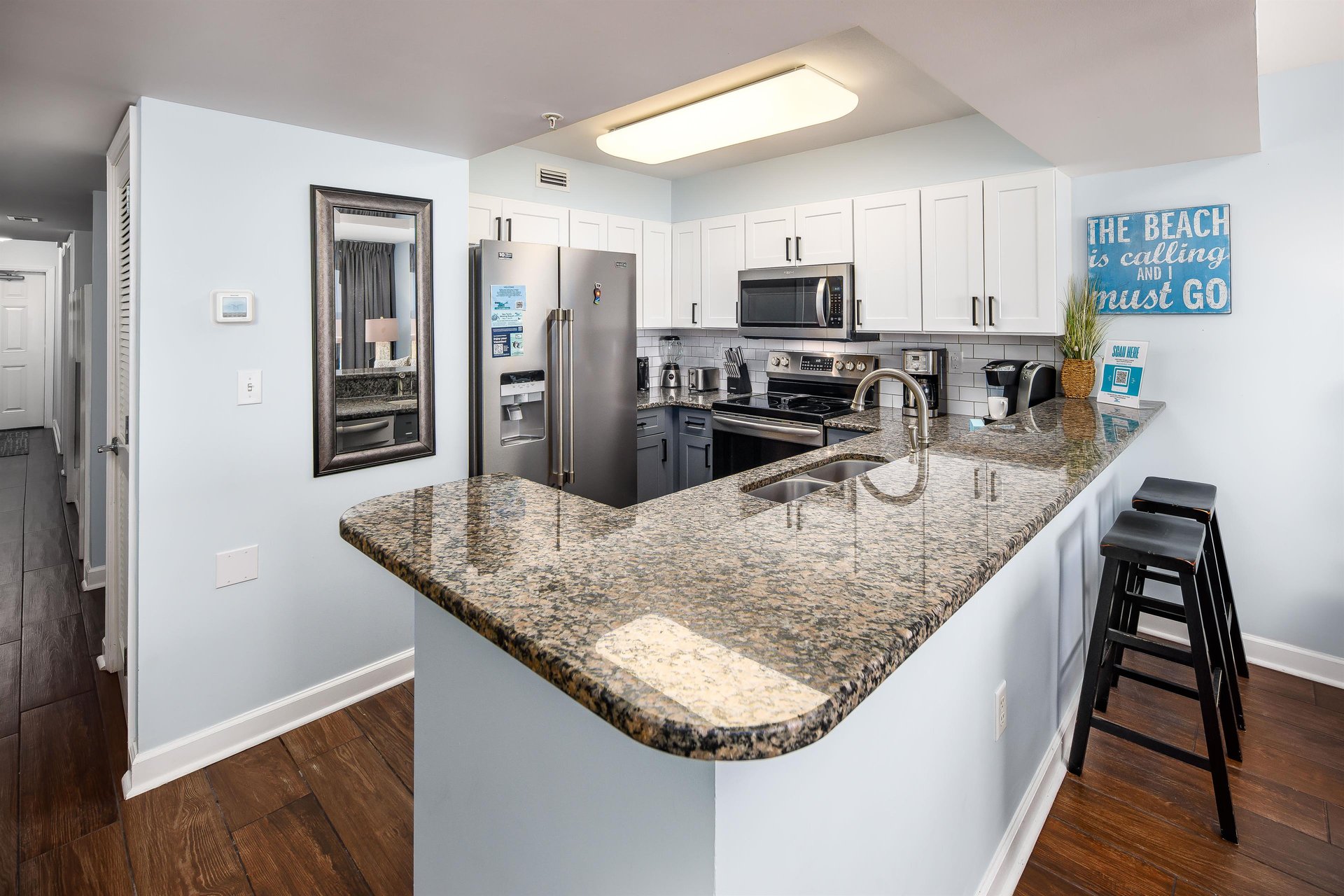 Bar stools allow the kids to have cereal while Dad cooks, yet they dont block views.