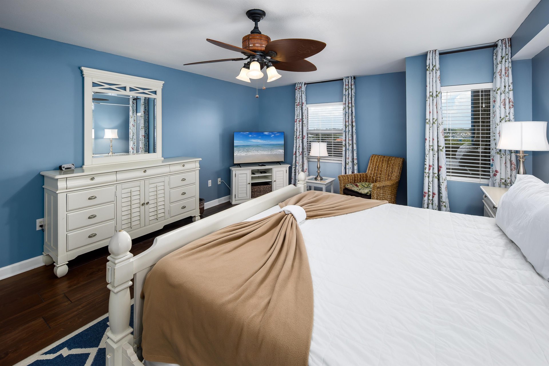 Large dresser with mirror and 37 inch LED TV complete the décor.