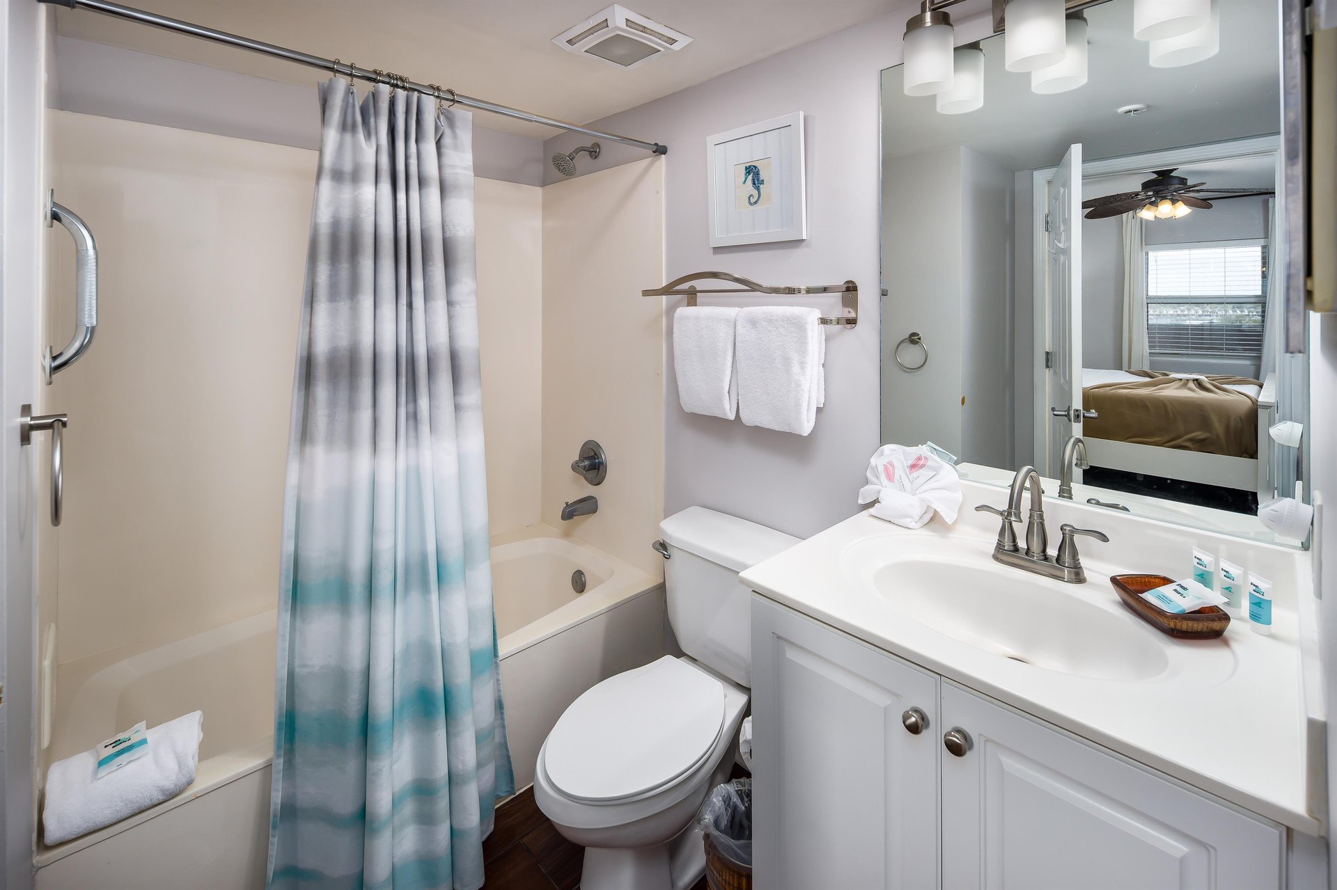 Can be accessed from the hall or the second bedroom. It also features a full tub and shower.