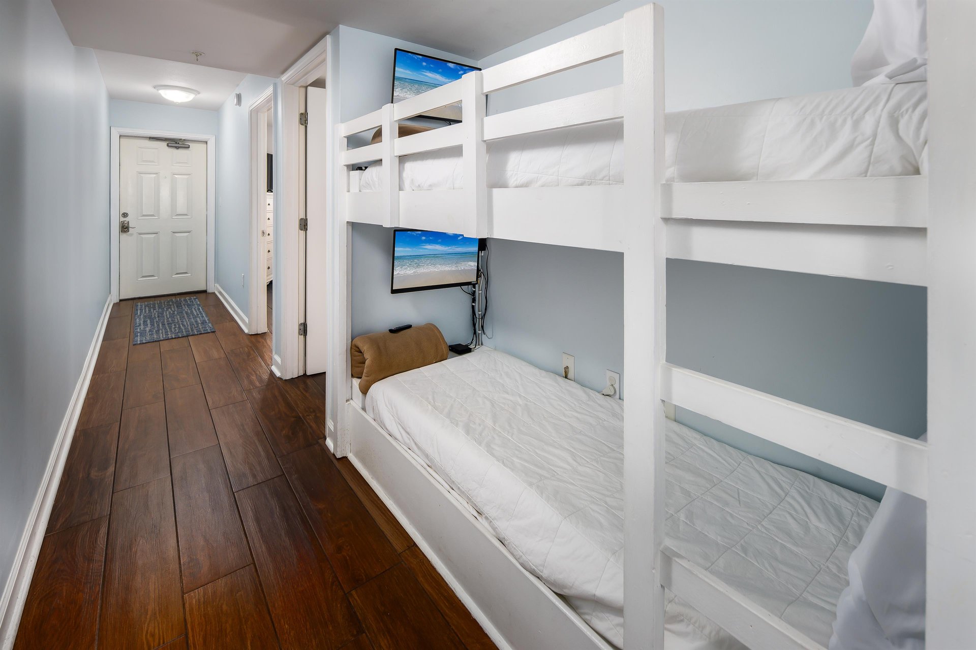 Each bunk has a TV.
