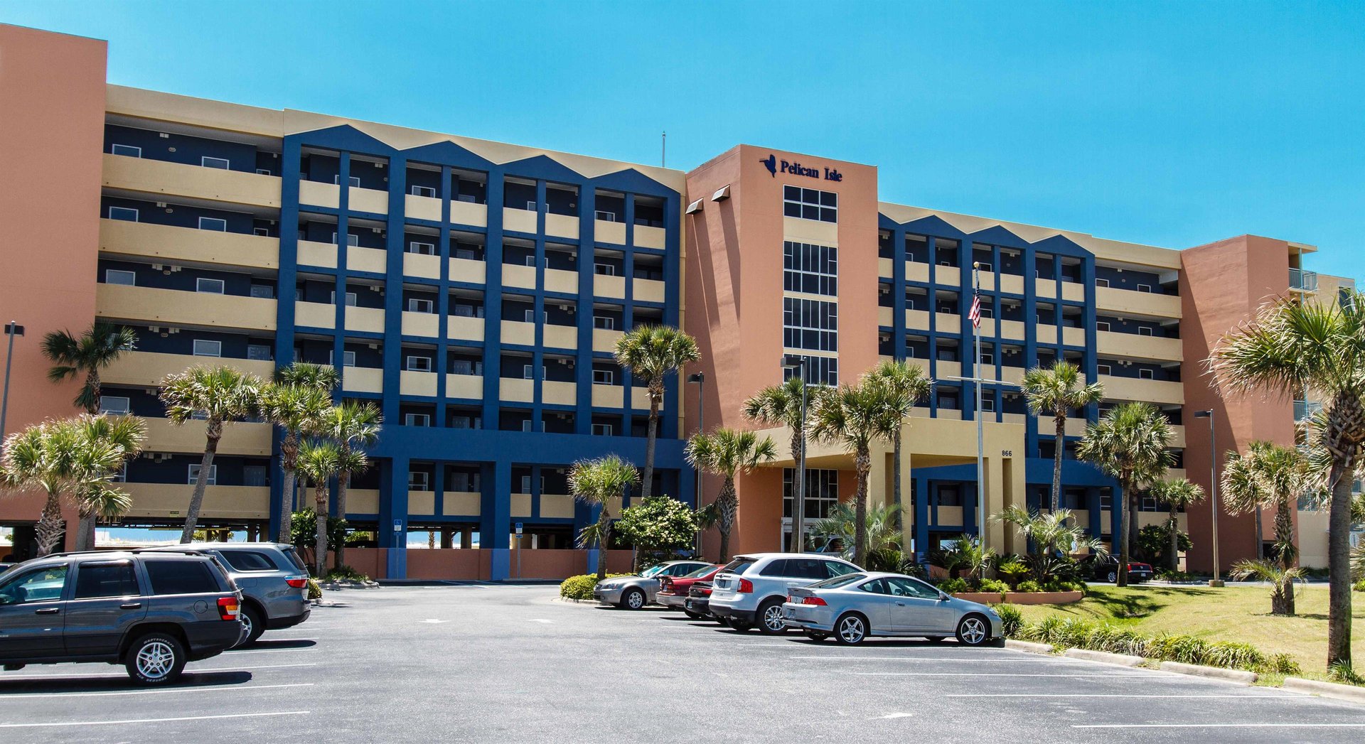 Built in 2002, the Pelican Isle is a beautiful sevenstory condo right on the beach. Each unit has a private balcony that directly faces the beach and views the resorts courtyard or pool area.